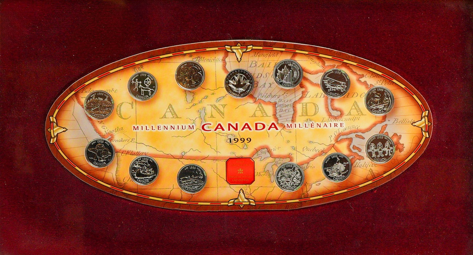 Royal Canadian Mint 1999 Millennium Quarter Coin Framed Set: A Royal Canadian Mint Millennium Canada 1999 Quarter Framed Set featuring 12 silver-toned commemorative coins displayed over a map backdrop in a wooden frame. Weight: 2.00 lb 2.00oz