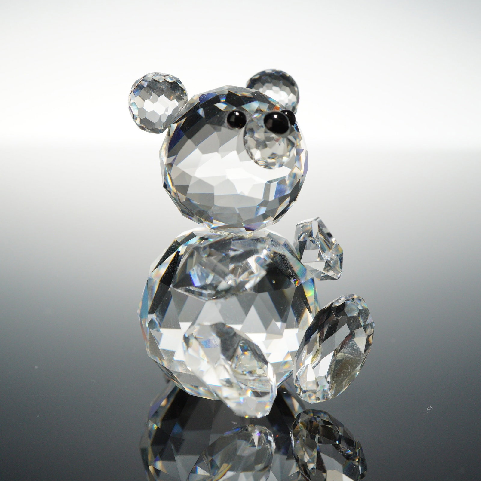 Swarovski Silver Crystal Large Bear Figurine with Box: A Swarovski faceted lead crystal figurine depicting a seated bear. The bear is composed of multiple clear faceted crystal elements, including a spherical head and body with smaller rounded ears and pa