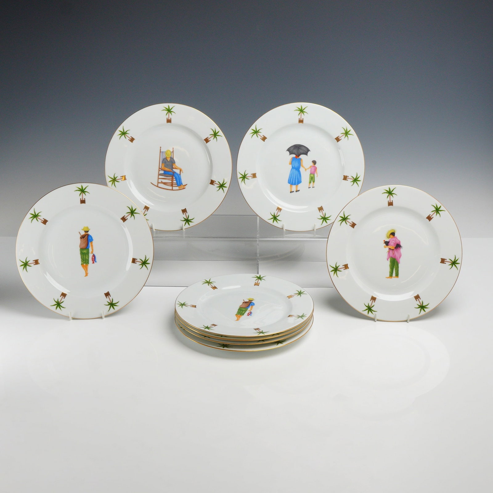 8pc Philippe Deshoulieres Limoges Porcelain Salad Plates in the Caraibes Pattern: This eight-piece set of porcelain salad plates was manufactured by Philippe Deshoulieres in Limoges, France, in the Caraibes pattern. Each circular rimmed plate features a central hand-colored or tran