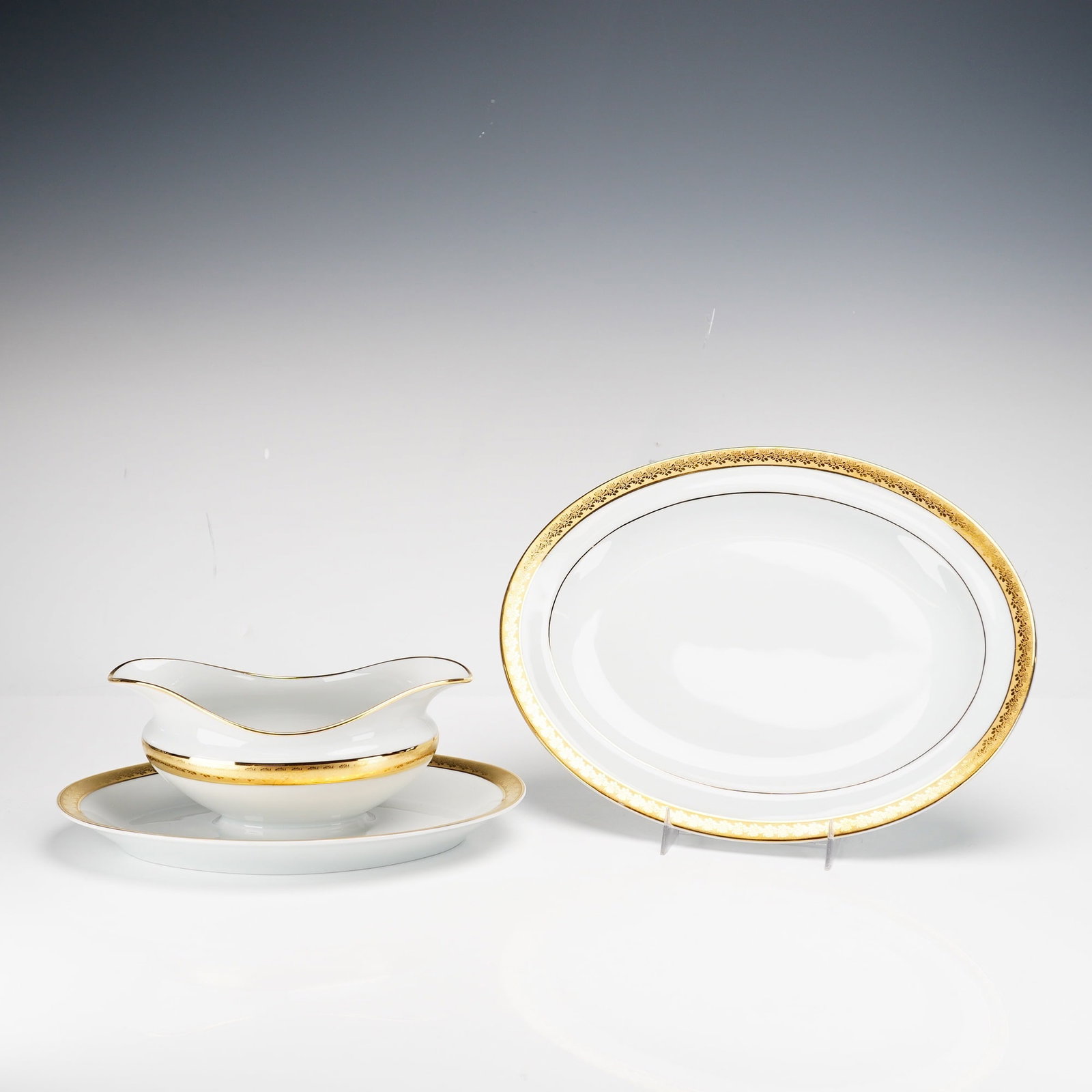 2pc Bernardaud Limoges France Oval Platter and Gravy Boat, Rhapsody Porcelain: This two-piece set of fine French porcelain is crafted by Bernardaud Limoges in the Rhapsody pattern. The set consists of one large oval serving platter 11" and a gravy boat with affixed oval underpla