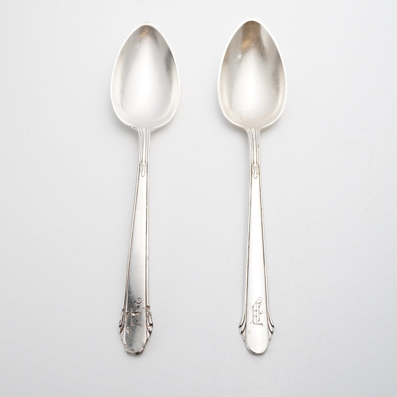 A Pair of Gorham Sterling Silver Spoons in the Hunt Club Pattern: A lot of 2 sterling silver spoons manufactured by the Gorham Manufacturing Company. This pair is executed in the Hunt Club pattern, which was introduced in 1930. The design features a refined Art Deco