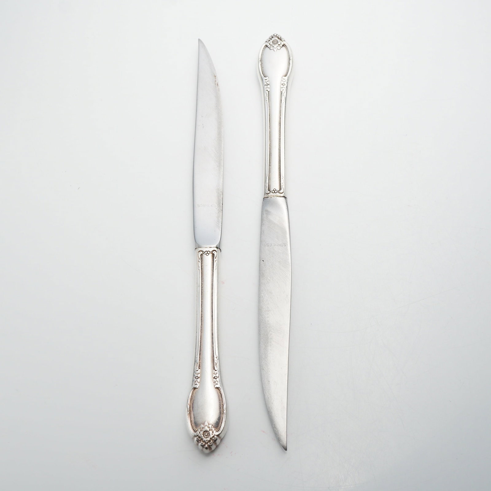 Two Sterling Silver Handled Knives with Floral and Scroll Decoration (1 of 3)