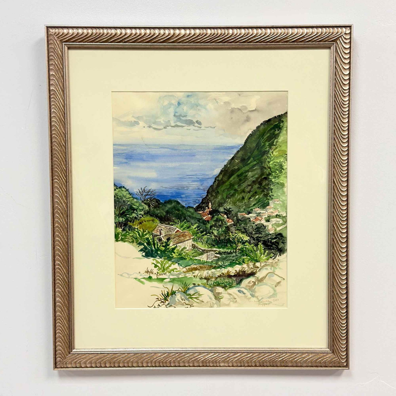 Joseph Sherly Sheppard (American, b. 1930) Watercolor on Paper, Windwardside, Saba: This original watercolor on paper depicts a vibrant tropical landscape identified as Windwardside on the island of Saba. The scene is rendered in an expressive, loose style, showing lush green hillsid