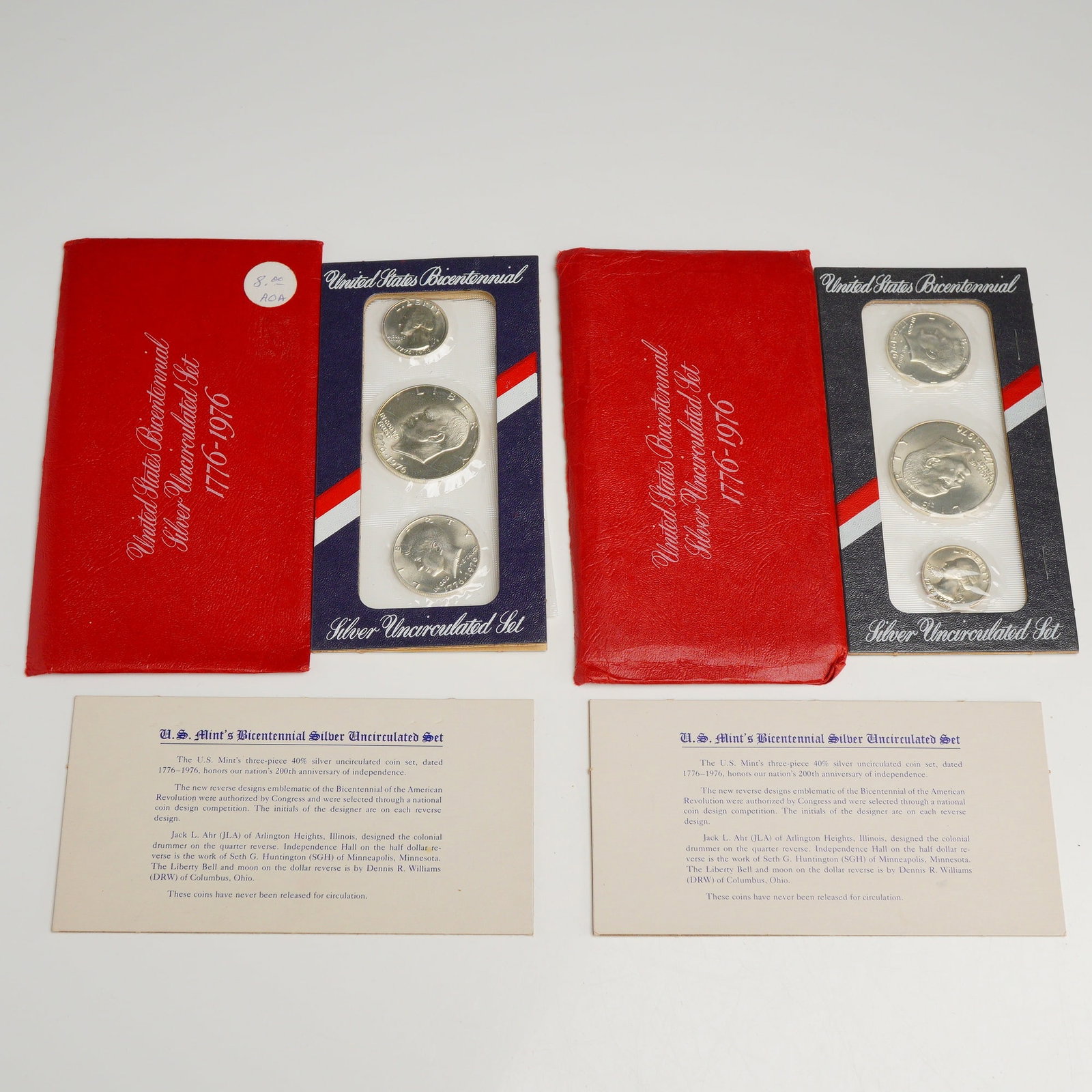 A Pair of 1976 US Bicentennial Silver Uncirculated Sets: This lot consists of a pair of 1976 US Bicentennial silver uncirculated sets, each containing three coins struck by the San Francisco Mint. Each set includes a Washington quarter, a Kennedy half dolla