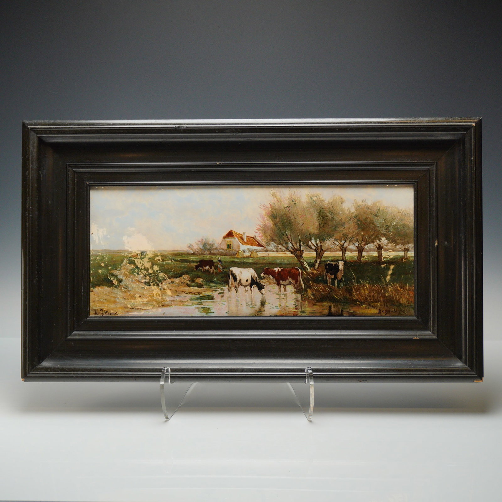 After H. J. Vrolijk Rozenburg den Haag Ceramic Plaque, Pastoral Landscape: This Dutch pastoral landscape is executed in enamel on a rectangular ceramic plaque, originating from the Rubin Coll. The scene depicts cattle grazing and drinking at a watering hole in the foreground