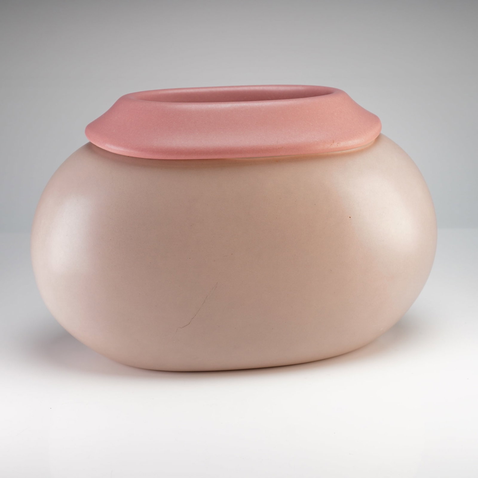 Treasure Craft Hawaii Masa Mami Pink Ikebana Pottery Vase: This glazed stoneware vessel was produced by Treasure Craft Hawaii and designed by Masa Mami. The form is a low, wide bulbous organic pebble shape featuring a raised, wide-tapered collar. It is finish