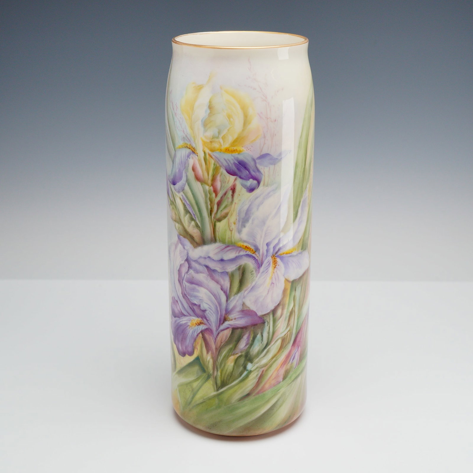 Lenox Belleek Hand-Painted Porcelain Iris Sleeve Vase, Signed E.G. Brooke: A tall, cylindrical porcelain sleeve vase manufactured by the Willets Manufacturing Company. The piece is crafted from cream-toned porcelain and features extensive hand-painted floral decoration throu