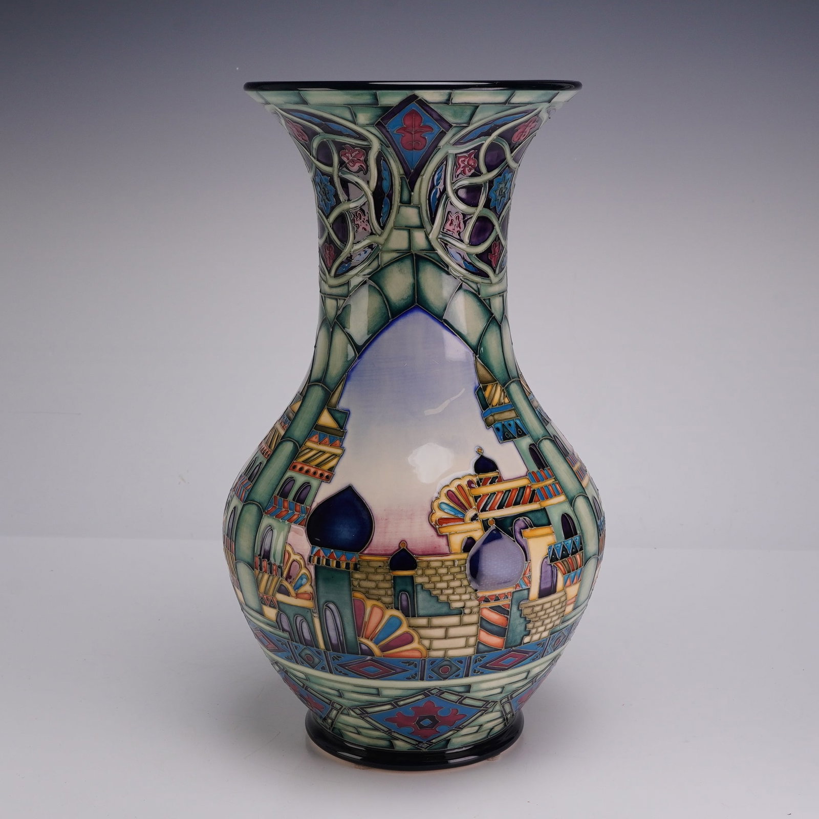 Moorcroft Pottery by Beverley Wilkes Limited Edition Vase, Halaka: This piece is constructed of glazed earthenware featuring multicolored tube-lined decoration with underglaze painting. The form is a large baluster shape with a tall slender neck transitioning into a 