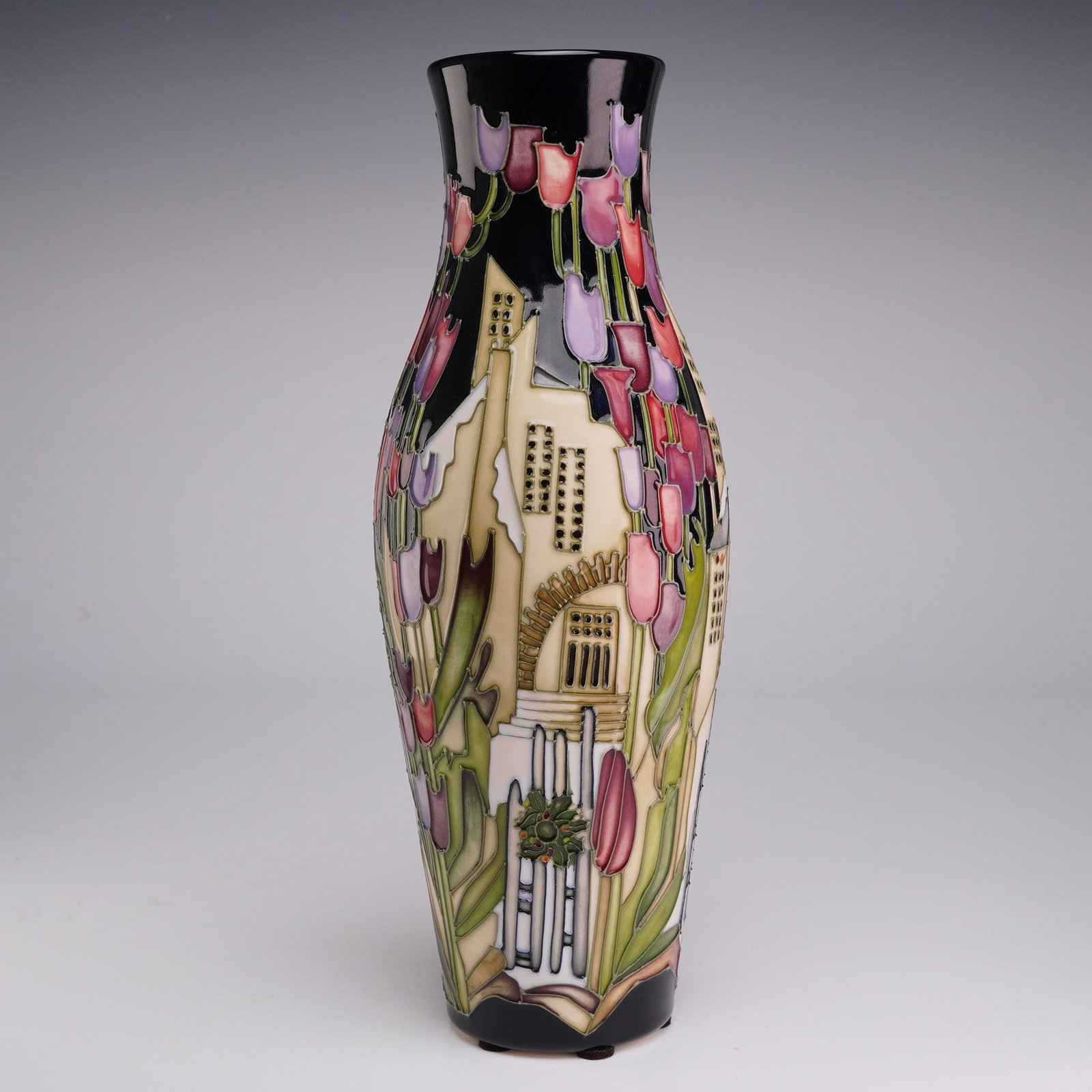 Moorcroft Pottery by Kerry Goodwin Trial Vase, Town of Flowers: A tall, slender ovoid-form earthenware vase manufactured by Moorcroft Pottery in Stoke-on-Trent, England. This piece is a trial prototype featuring the Town of Flowers pattern designed by Kerry Goodwi