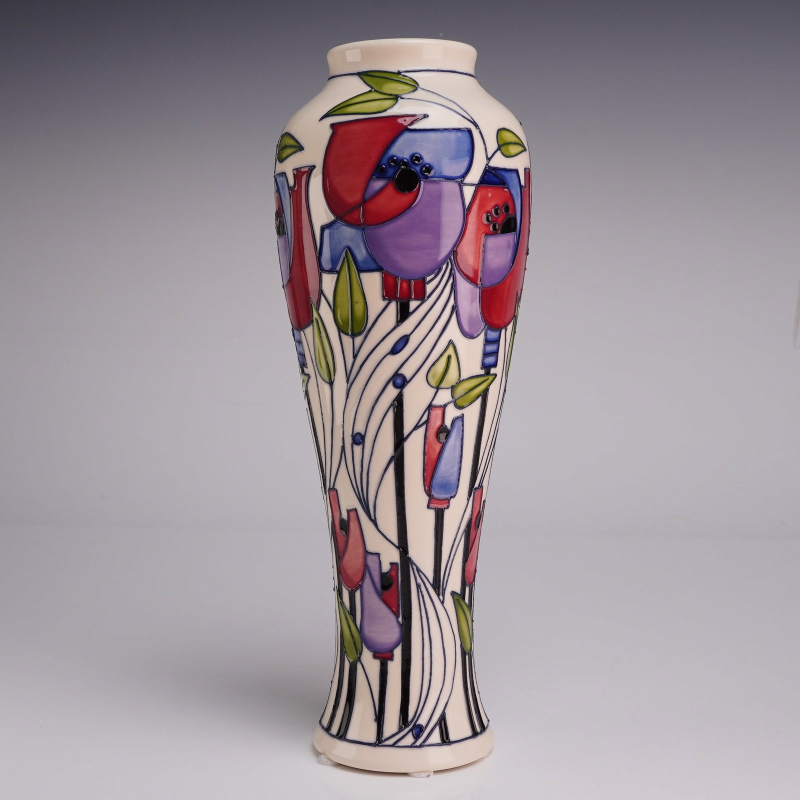 Moorcroft Rachel Bishop Millside Pottery Vase Dated 2018: This is a modern Moorcroft pottery vase in the Millside pattern, designed by senior designer Rachel Bishop. The earthenware vessel features a tall, slender, tapered form with a slightly flared base an