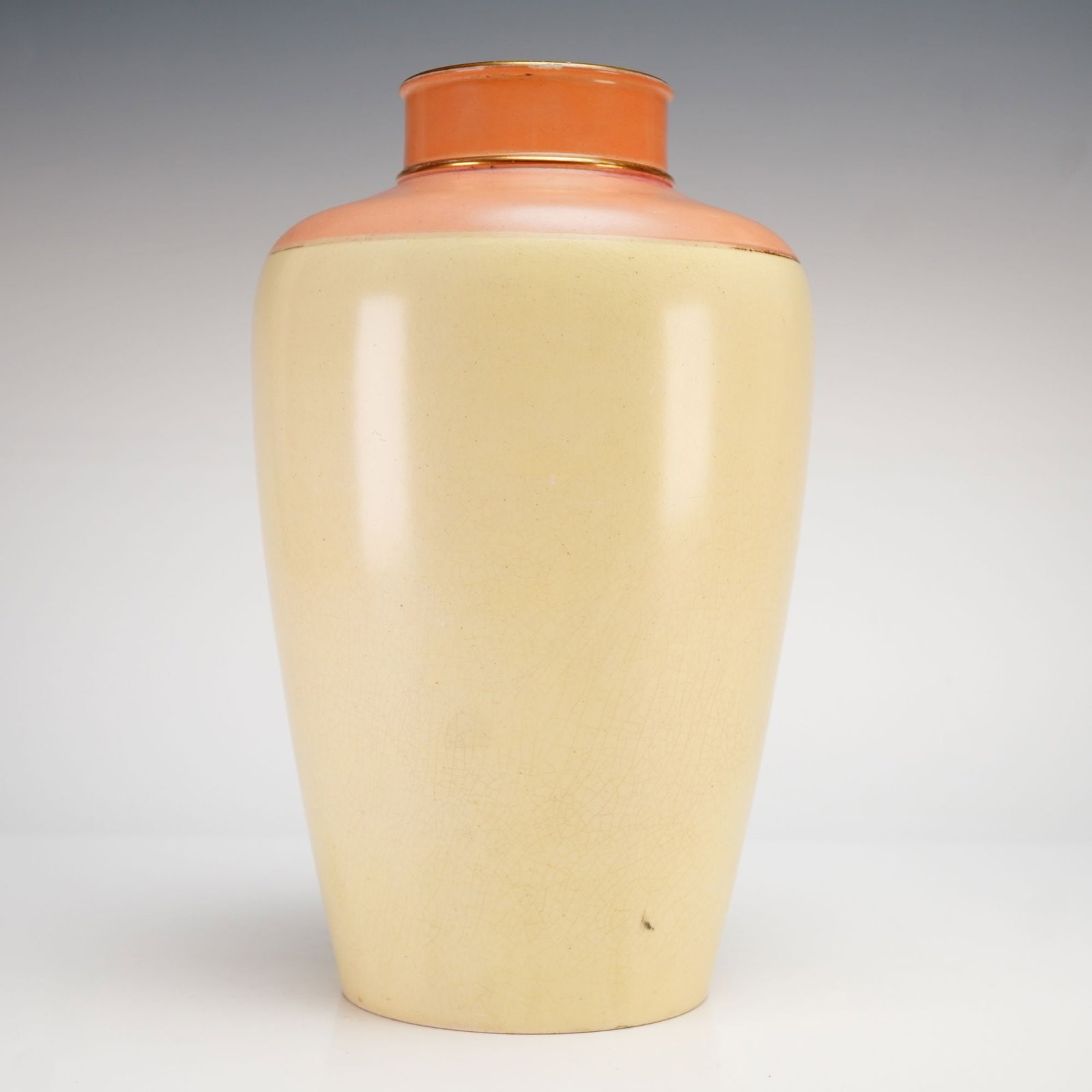 A Wedgwood Porcelain Vase in Pink and Yellow with Gold Gilded Rim Accents: This Wedgwood porcelain vase dates to approximately 1880 and features a tapering ovoid body with a flat shoulder and a short cylindrical neck. The exterior is decorated with three distinct horizontal 