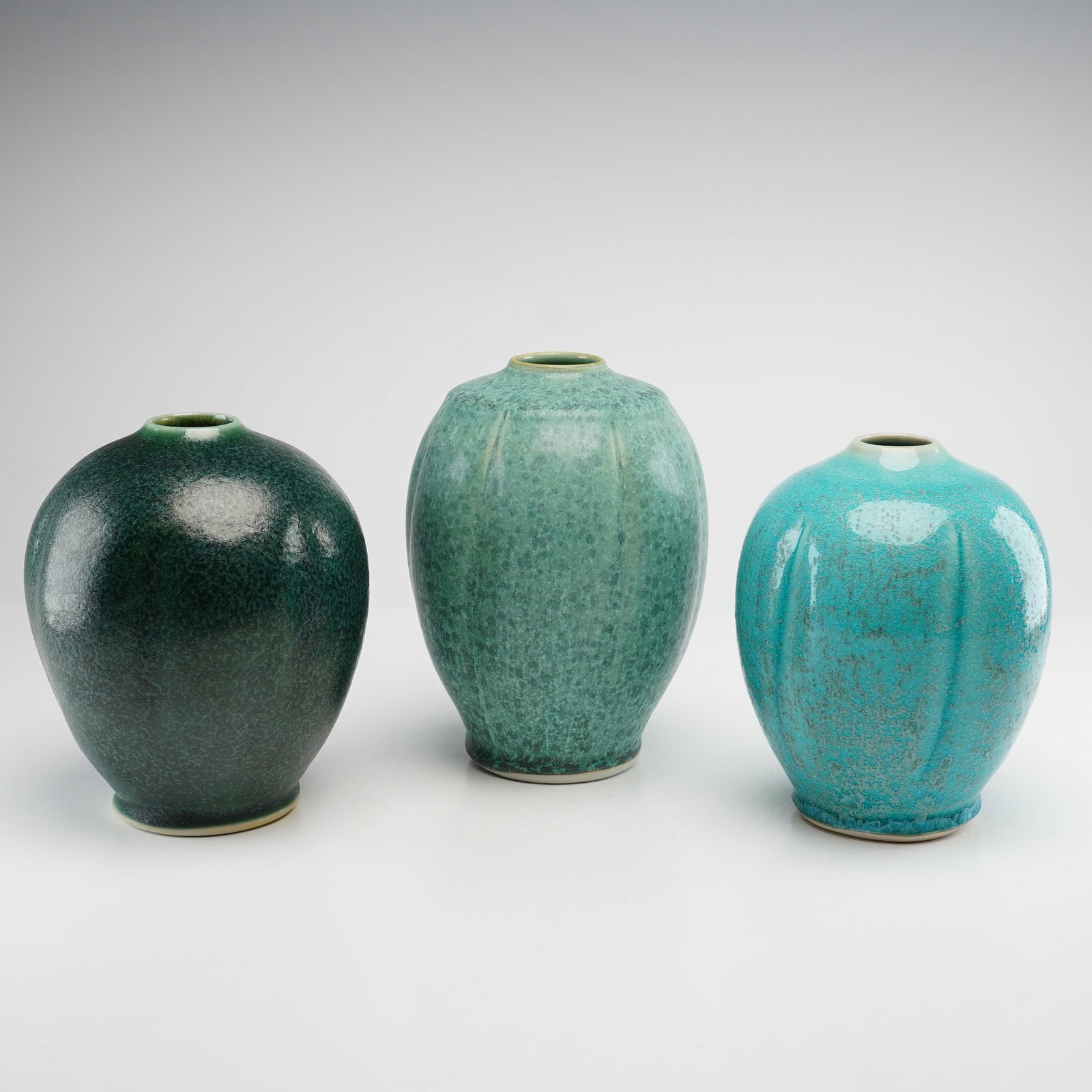 3pc Ben Owen III Studio Pottery Vases: A trio of hand-thrown studio pottery vases by Ben Owen III, a master potter based in Seagrove, North Carolina. This group features three distinct forms and glazes characteristic of the artist's work. 