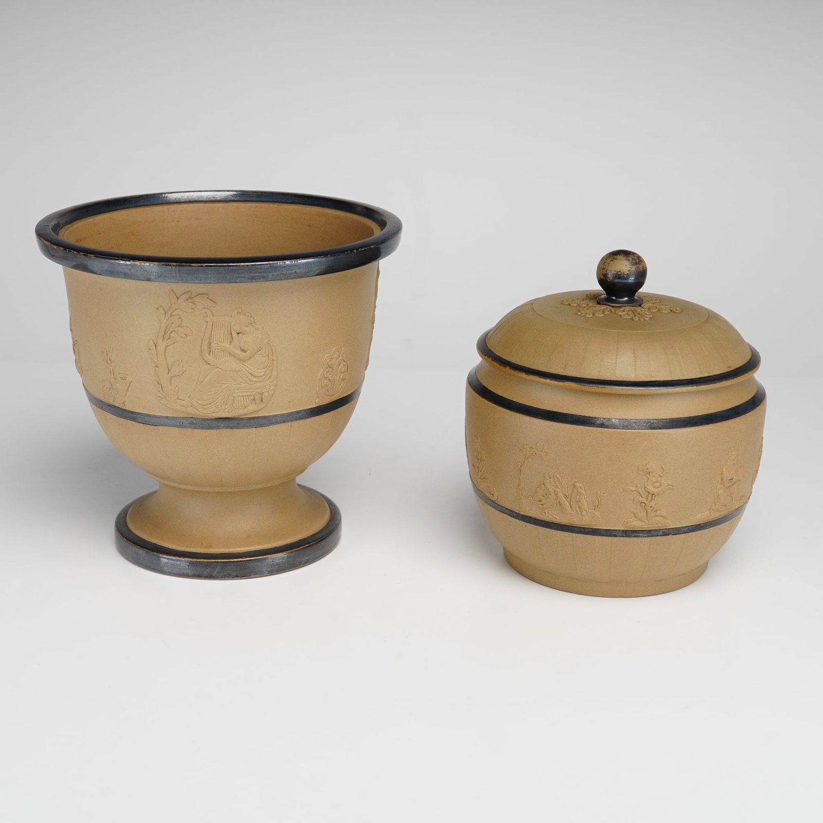 2pc Samuel Hollins Cane-Colored Stoneware: This lot features two pieces of late 18th to early 19th-century English cane-colored stoneware produced by the potter Samuel Hollins. The set includes a footed bowl with a flared rim and pedestal base