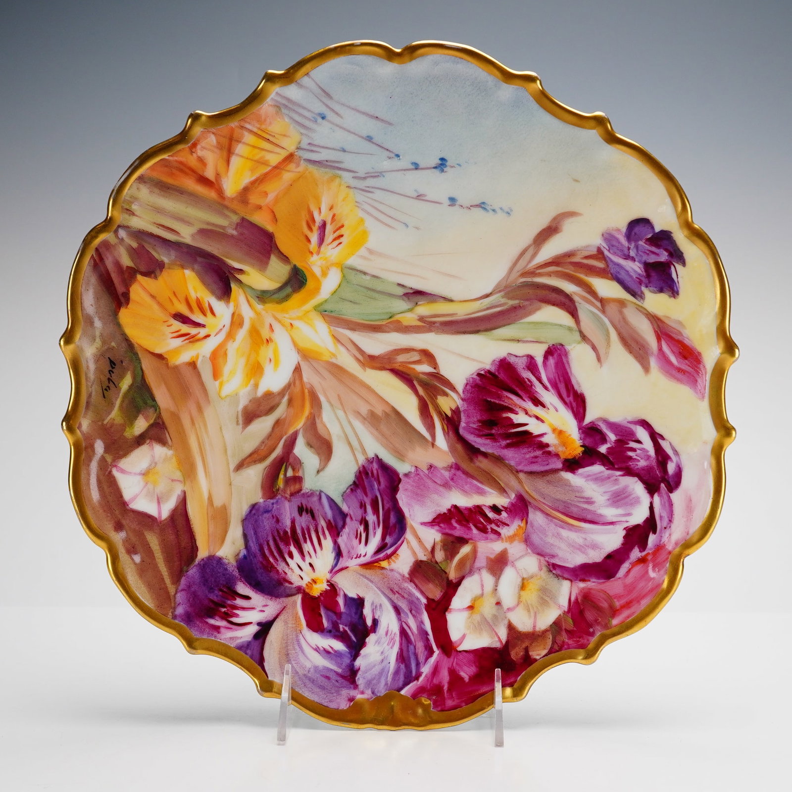 Flambeau Limoges France Porcelain Wall Plate Hand Painted and Signed: This large Limoges porcelain wall plate features a hand painted floral design on a porcelain blank manufactured by Tressemanes and Vogt. The front is decorated with an Art Nouveau composition of large