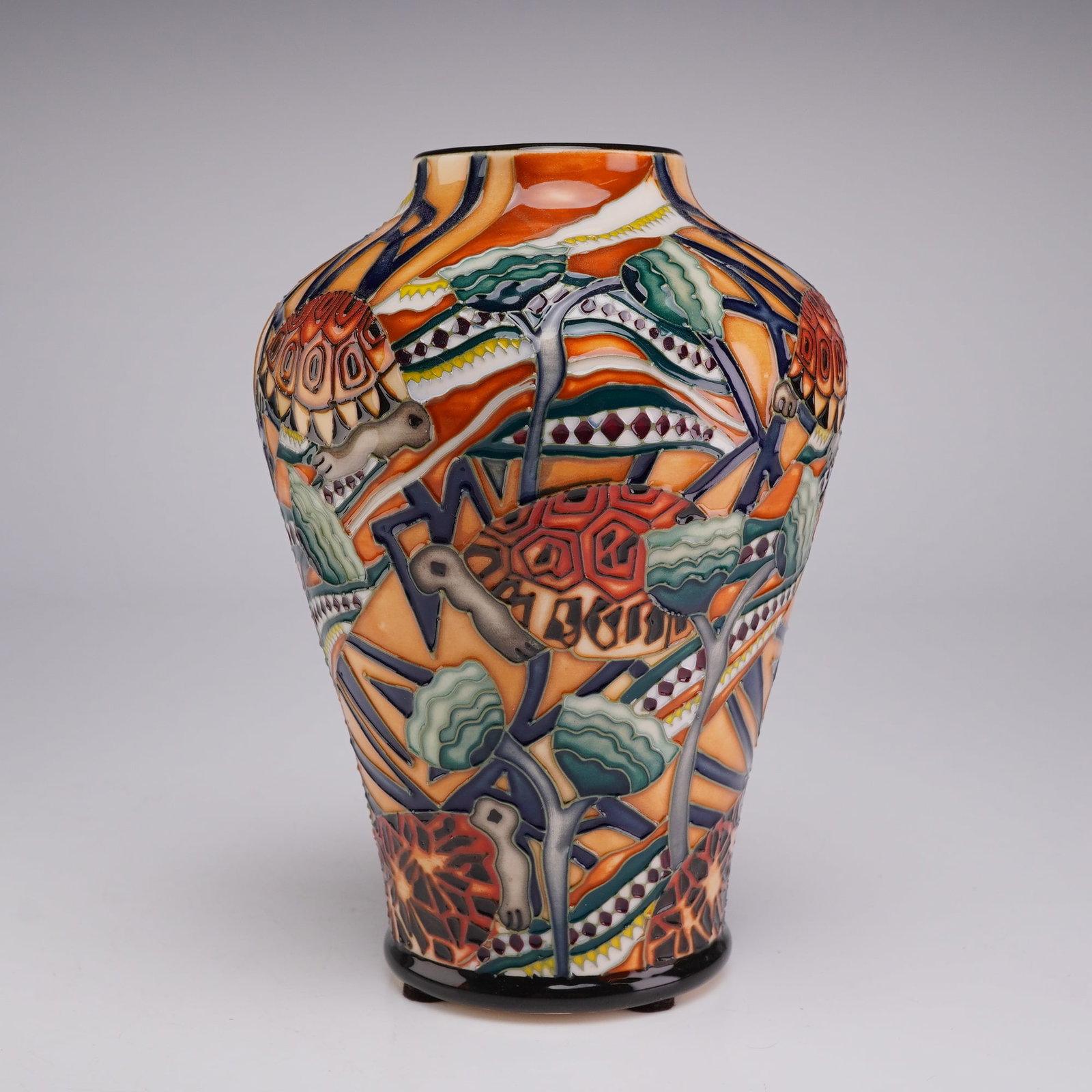 Moorcroft Pottery South African Design Competition 2008 Winner Vase, Tortoise: The bulbous vessel is designed with a tapered neck and a slightly flared rim, decorated in a complex, stylized landscape motif featuring multiple tortoises. The decoration is executed using the factor