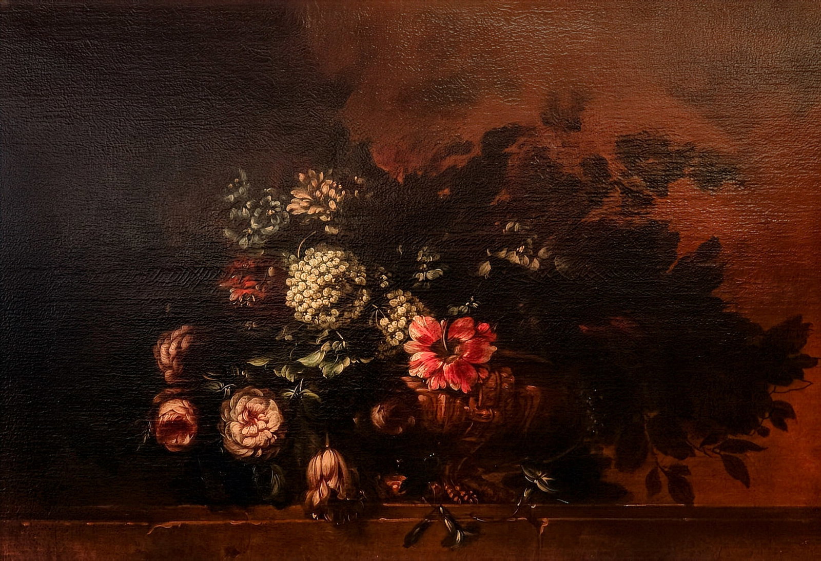 After Andrea Scacciati, Baroque Oil Painting on Canvas, Still-Life Flowers: An exquisite 18th century Florentine school still life after Andrea Scacciati, depicting a lush arrangement of tulips, lilies, hyacinths, roses, and other blossoms gathered in a dramatic composition. 