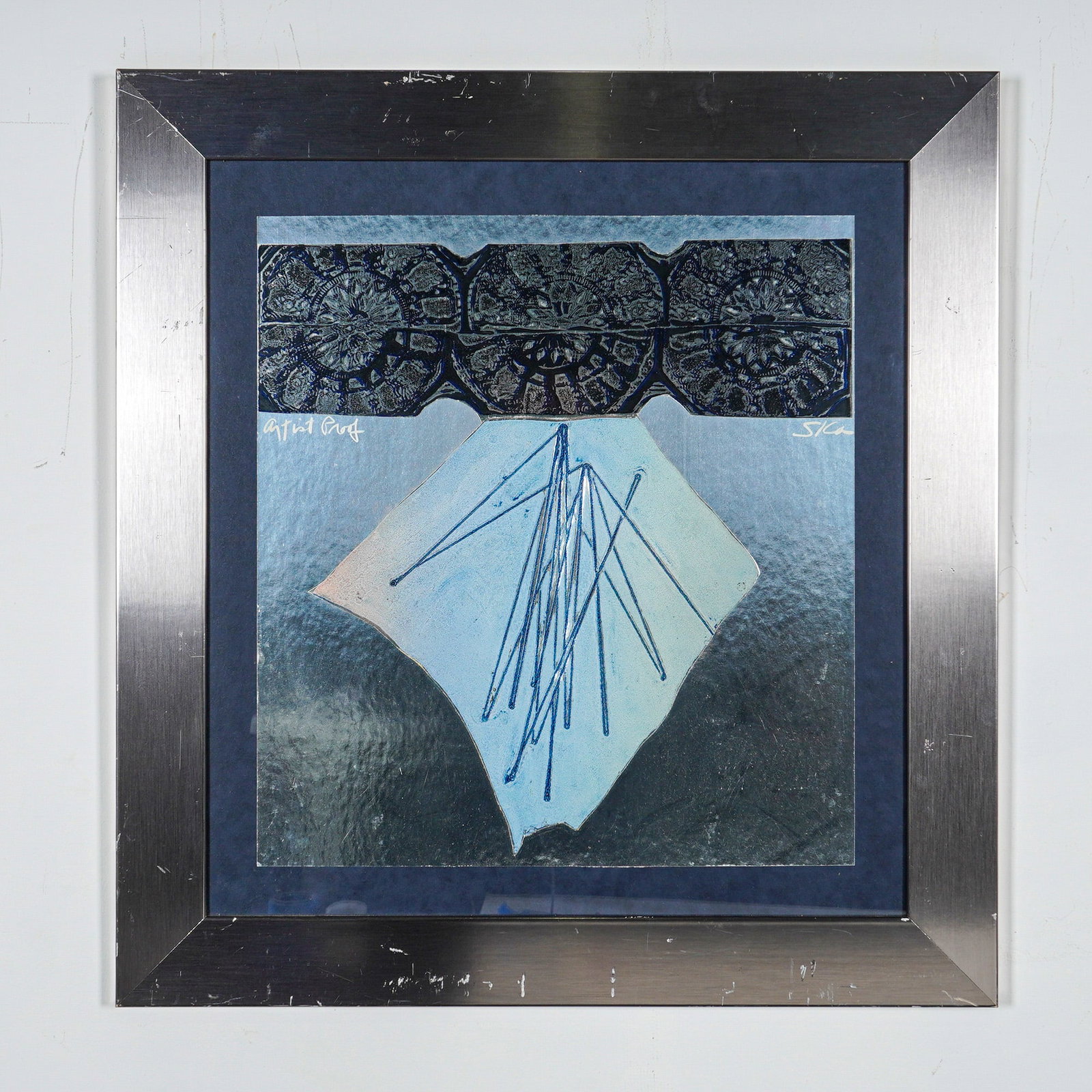 Sica (American, b. 1932) Framed Mixed Media on Metallic Ground, Signed: This contemporary abstract mixed media work by the artist Sica (Marilyn Sica Thompson, American, 1932-2022) is executed on a reflective metallic ground. The composition features a horizontal upper reg