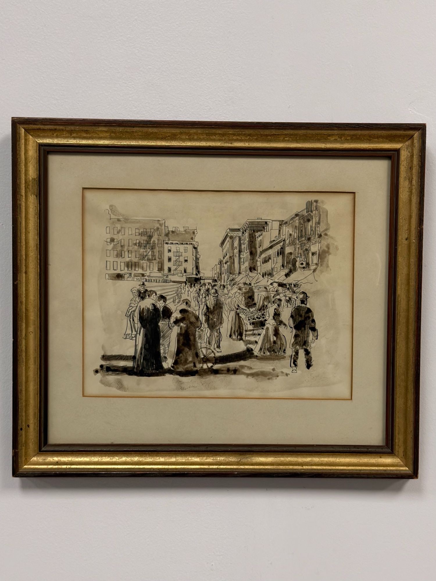 Late 19th Century Urban Market Scene, Graphite and Ink Wash on Paper: This framed graphite and ink wash on paper work in sepia tone depicts a lively urban cityscape and marketplace. The composition is filled with a dense crowd of figures in late 19th-century attire, inc