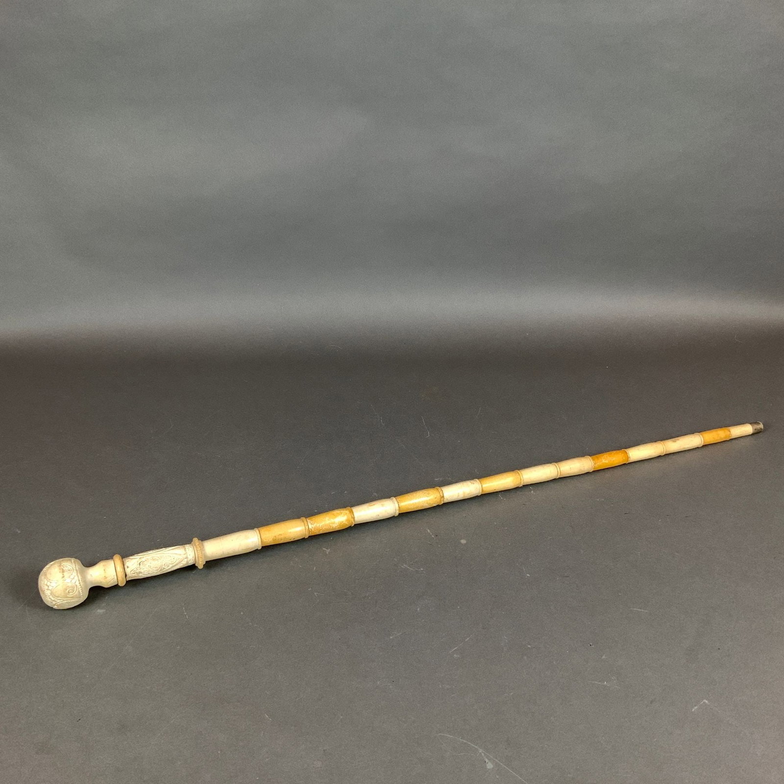 Carved Bone Handle Walking Cane with Multi-Segment Shaft (1 of 5)