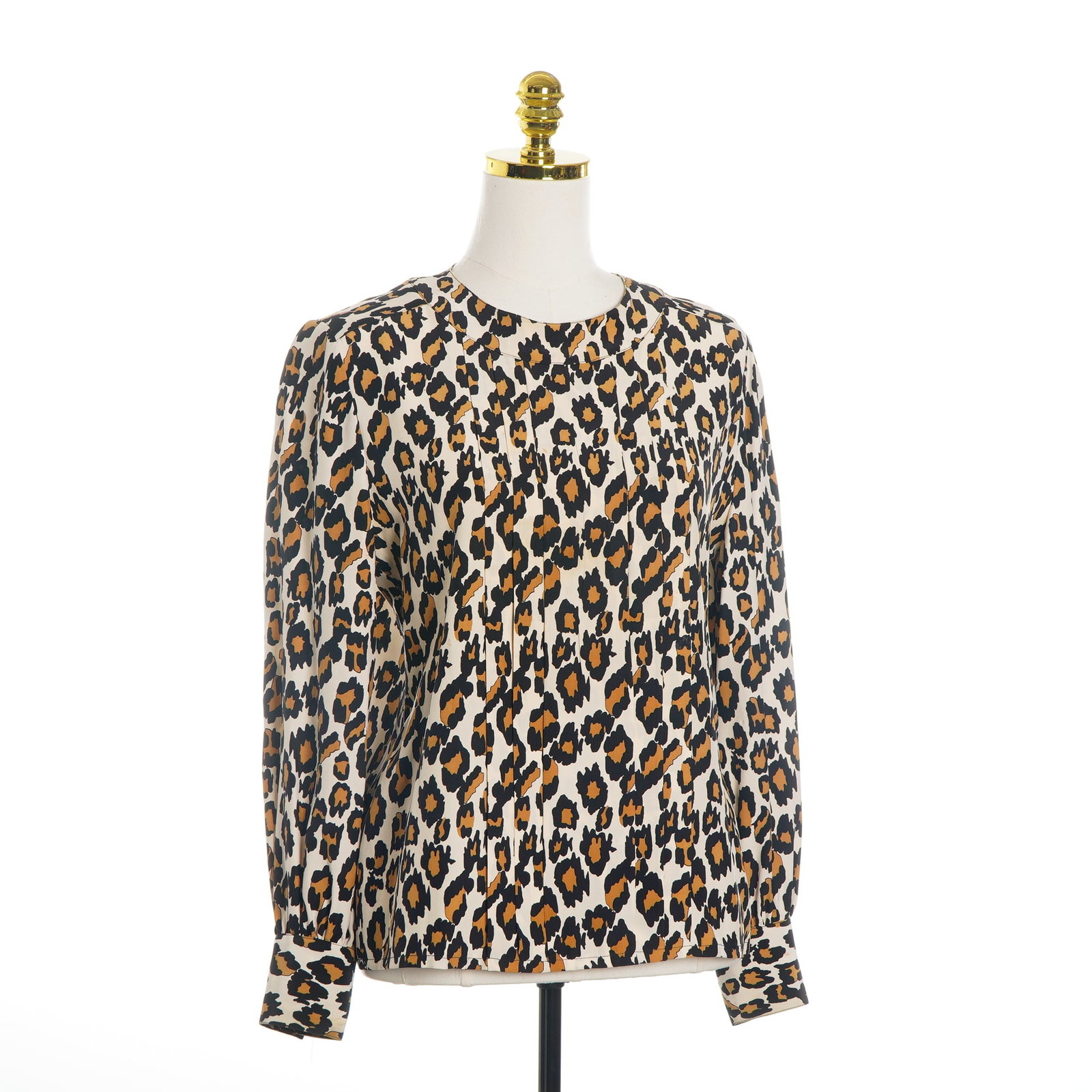 Lillie Rubin 100 Percent Silk Leopard Print Blouse: This vintage long-sleeved blouse by Lillie Rubin is constructed from 100 percent silk and features a classic leopard print motif in shades of black, ochre, and cream. The garment is designed with a st