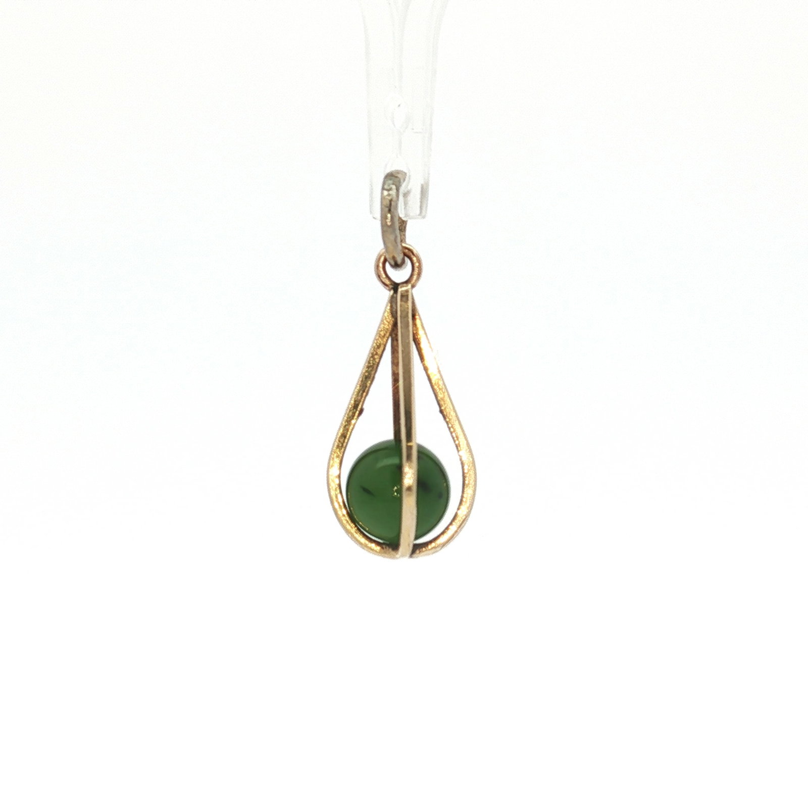 14K Gold Cage Pendant with Nephrite Jade Bead: A yellow gold teardrop-shaped cage pendant housing a nephrite jade bead. Marked 14K. Dimensions: 1"L x 0.25"W Weight: 1g