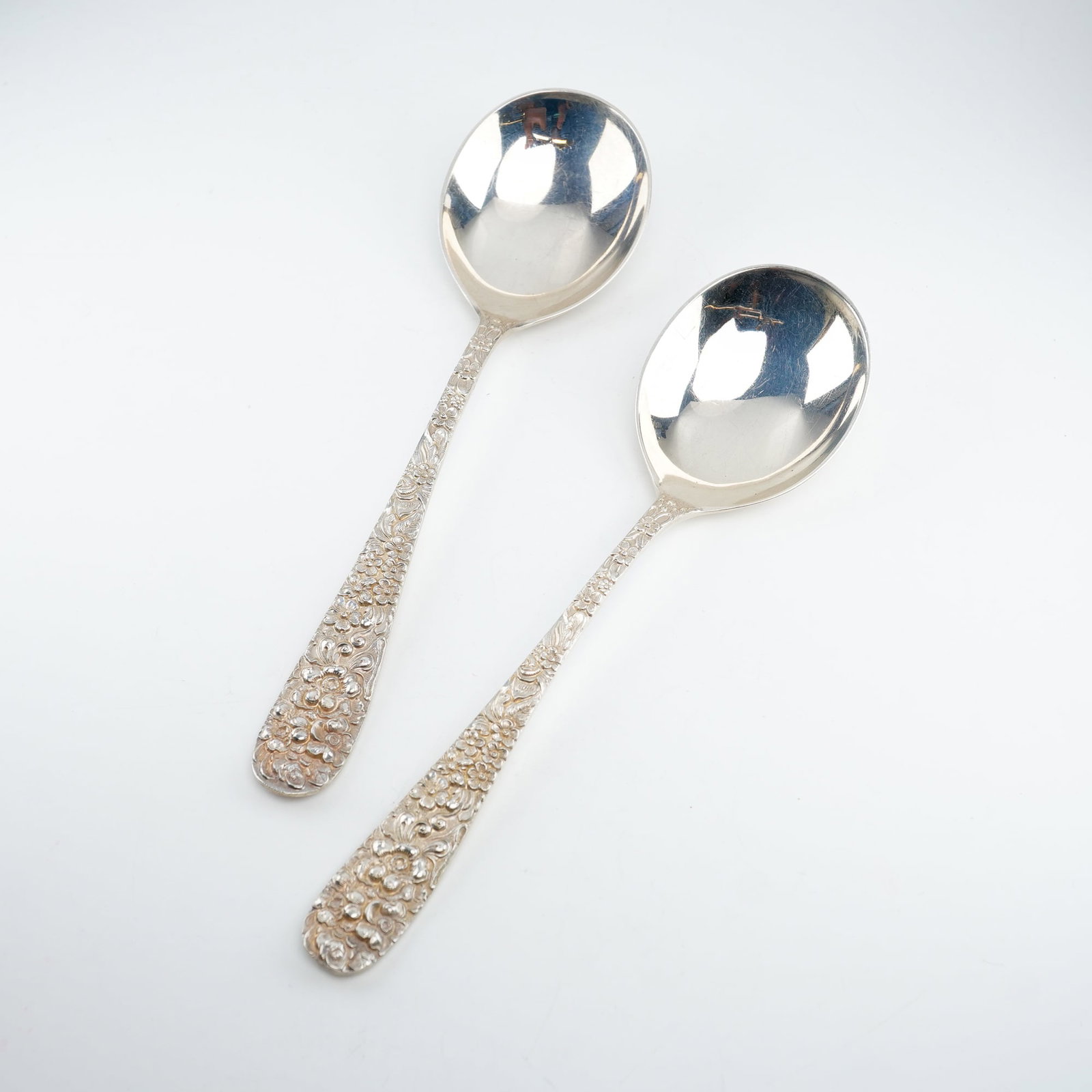2pc Kirk Stieff Sterling Silver Round Bowl Soup Spoons, Stieff Rose: Set of 2 Kirk Stieff sterling silver round bowl soup spoons in the classic Stieff Rose pattern. First introduced in 1892, this design showcases elaborate floral repousse detailing in rich relief along
