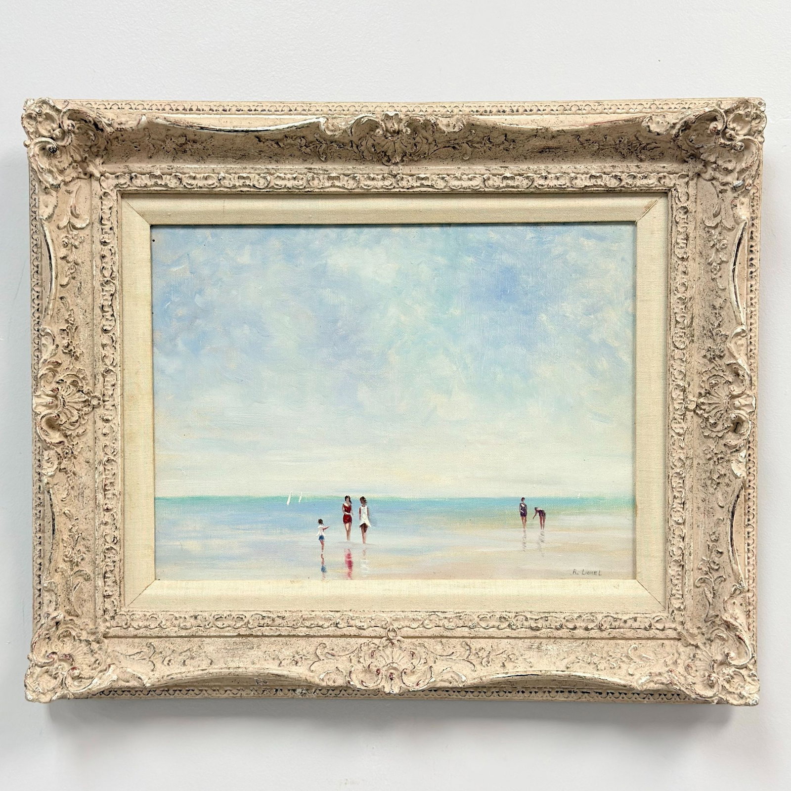 R. Lionel, Beach Scene, Oil on Canvas, Signed: This original oil painting on stretched canvas is signed R. Lionel in the lower right corner. The artwork depicts an impressionistic coastal scene with five figures wading in shallow water under a lar