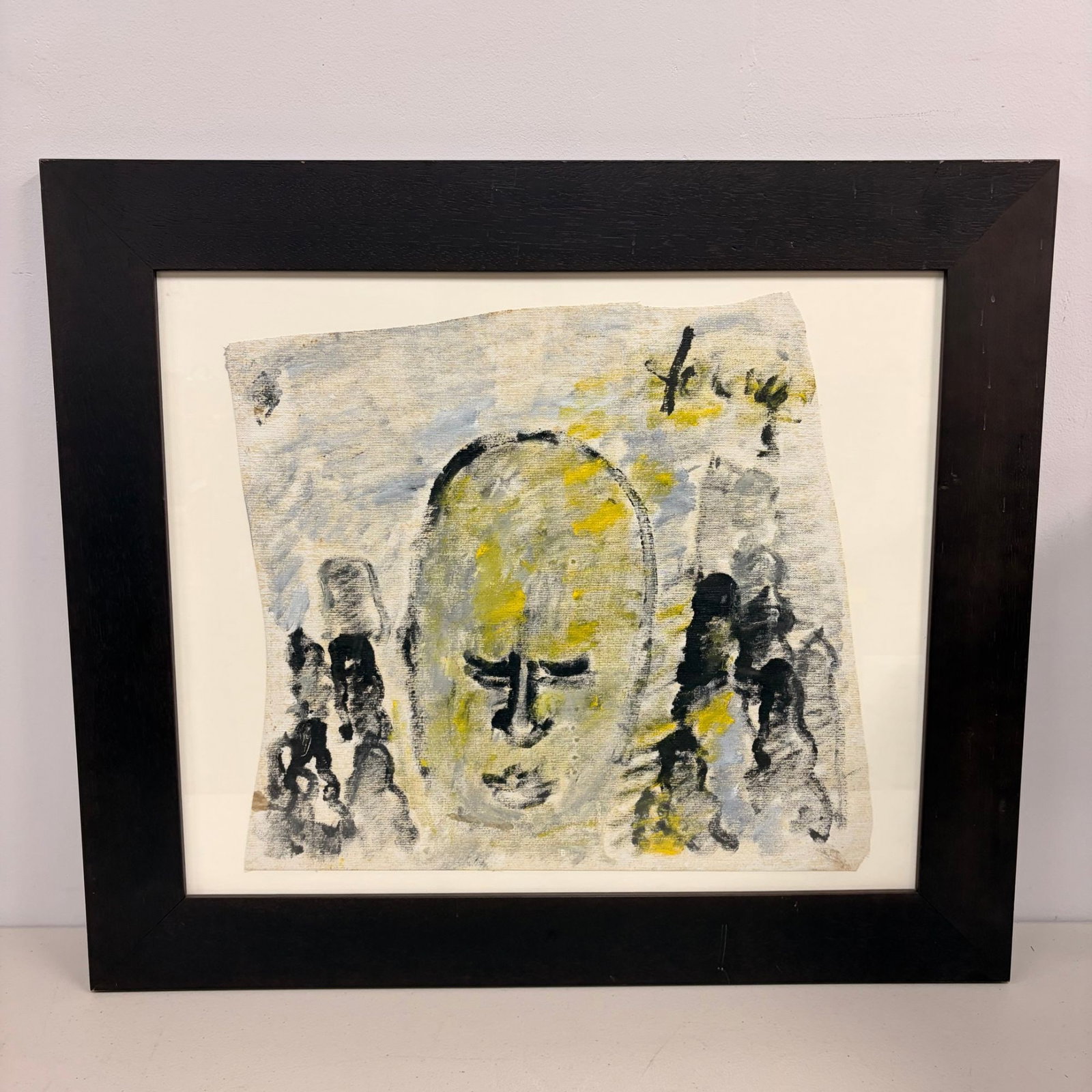 Purvis Young (American, 1943-2010), Head with Figures, Framed Oil on Unstretched Canvas: This painting is executed in oil on an irregularly cut and frayed unstretched canvas fragment, characteristic of the artist's Outsider Art style. The composition features a large, centralized, stylize