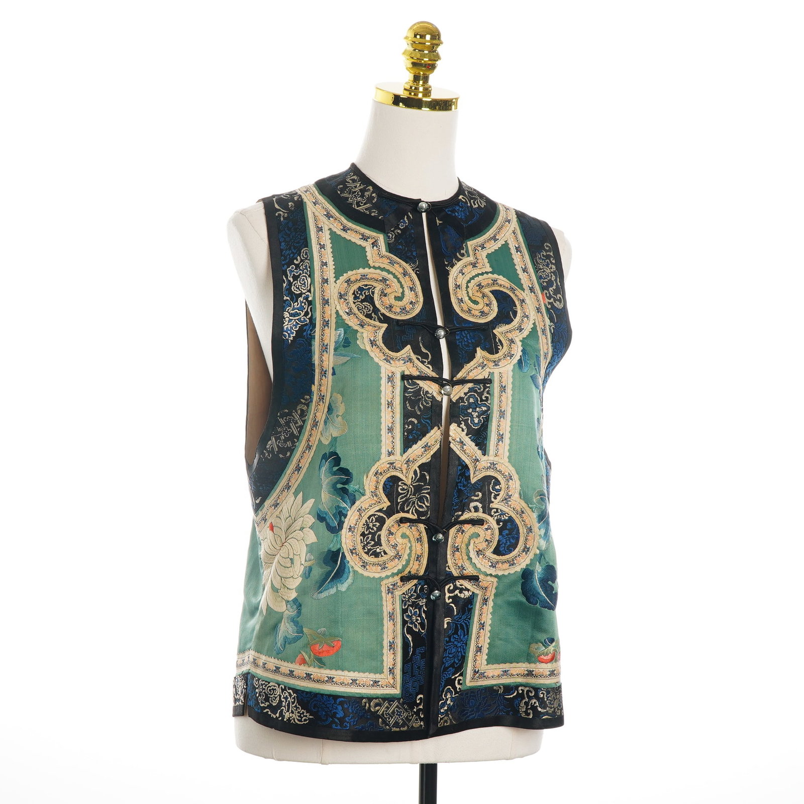 Women's Stitched Silk Vest with Floral Accents and Bead Enclosures: This garment is a vintage stitched women's vest, or kanjian, designed in the tradition of Chinese Tang and Qing dynasty attire. It is constructed from emerald green silk satin featuring silk thread