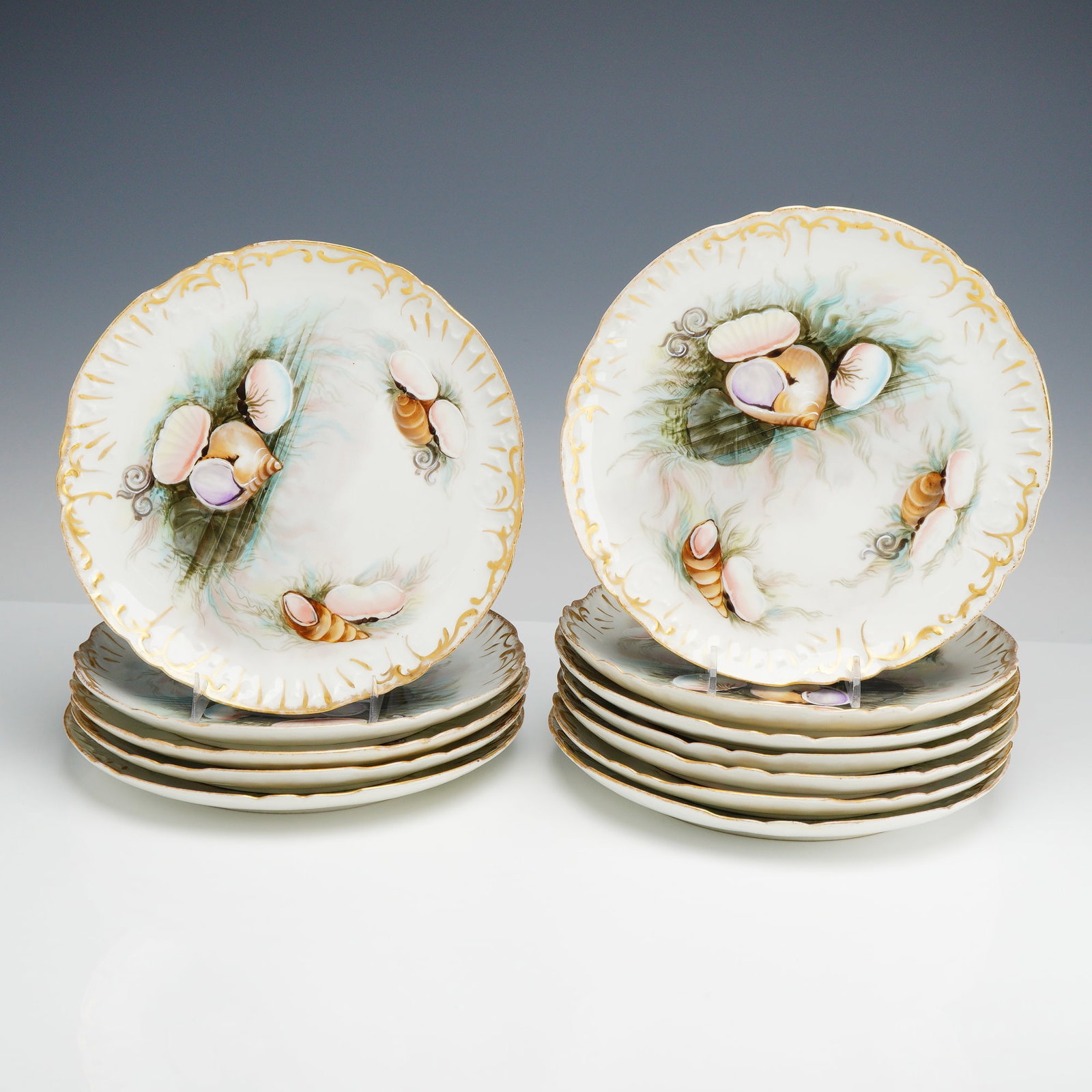 Set of 12 Jean Pouyat Limoges Hand-Painted Porcelain Dessert Plates, Shell Motif