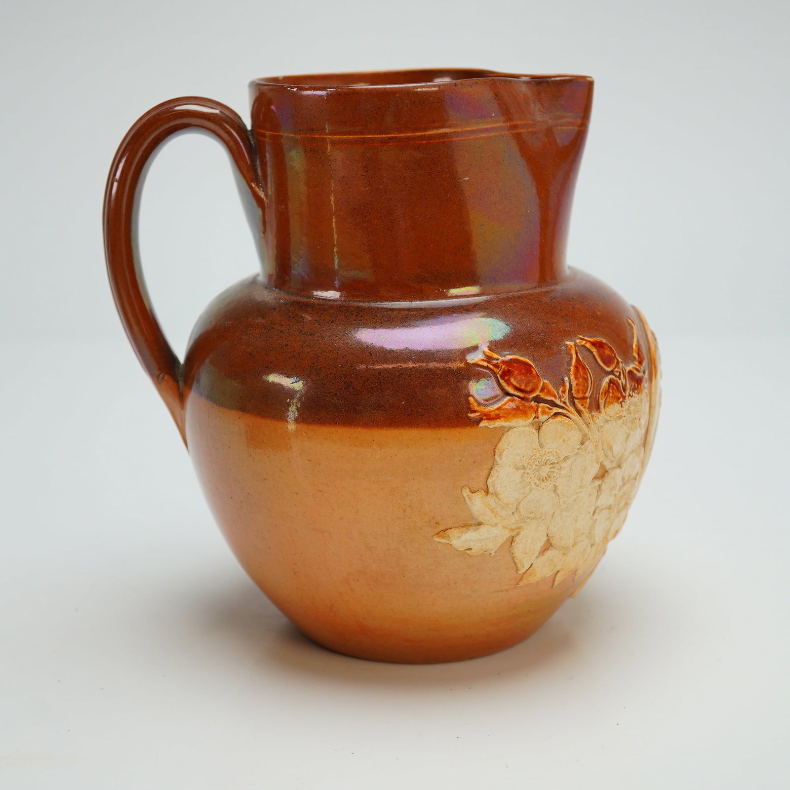 Doulton Lambeth Stoneware Jug, 1893 Royal Wedding: Jug is commemorating the 1893 royal wedding of Prince George and Princess Mary. This late Victorian piece features a bulbous body with a two-tone glaze, transitioning from a lustrous, iridescent dark 