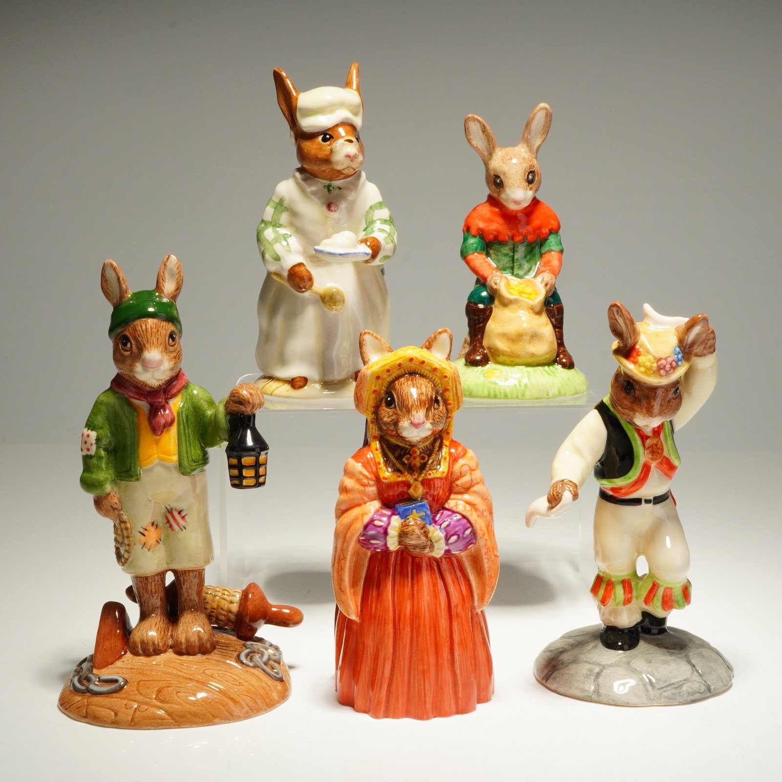5pc Royal Doulton Bunnykins Figurines: A 5pc collection of Royal Doulton Bunnykins figurines, each hand-made and hand-decorated with polychrome glazes. This assortment includes Seaman DB322 from The Shipmates Collection, Catherine of Arago
