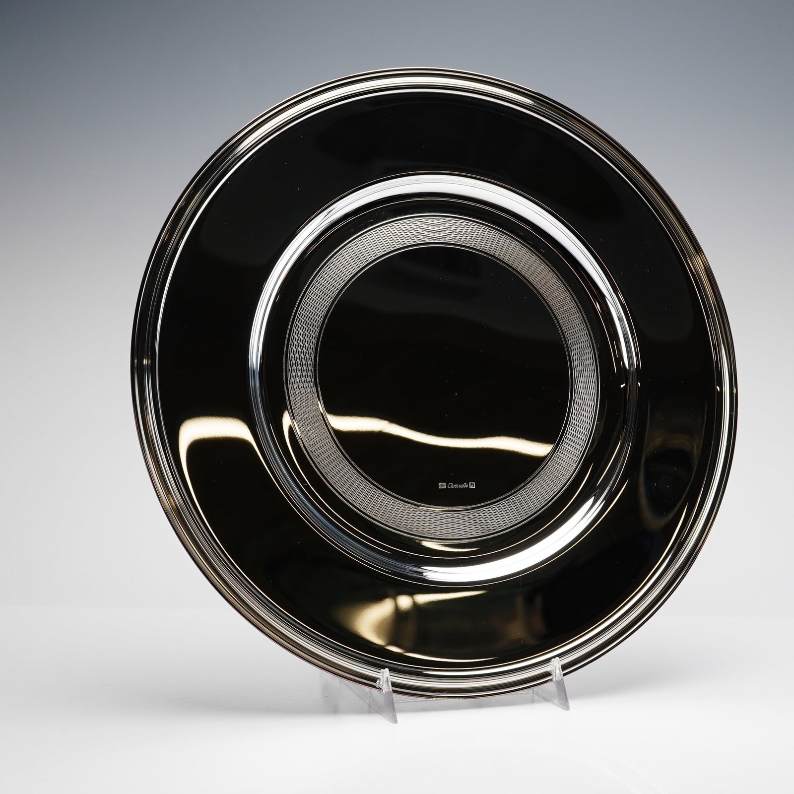 Christofle Silver-Plated Charger Presentation Plate, Albi: This Christofle silver-plated charger or presentation plate is from the Albi collection, a design created in 1968 inspired by the clean architectural lines of the Albi Cathedral in France. The circula