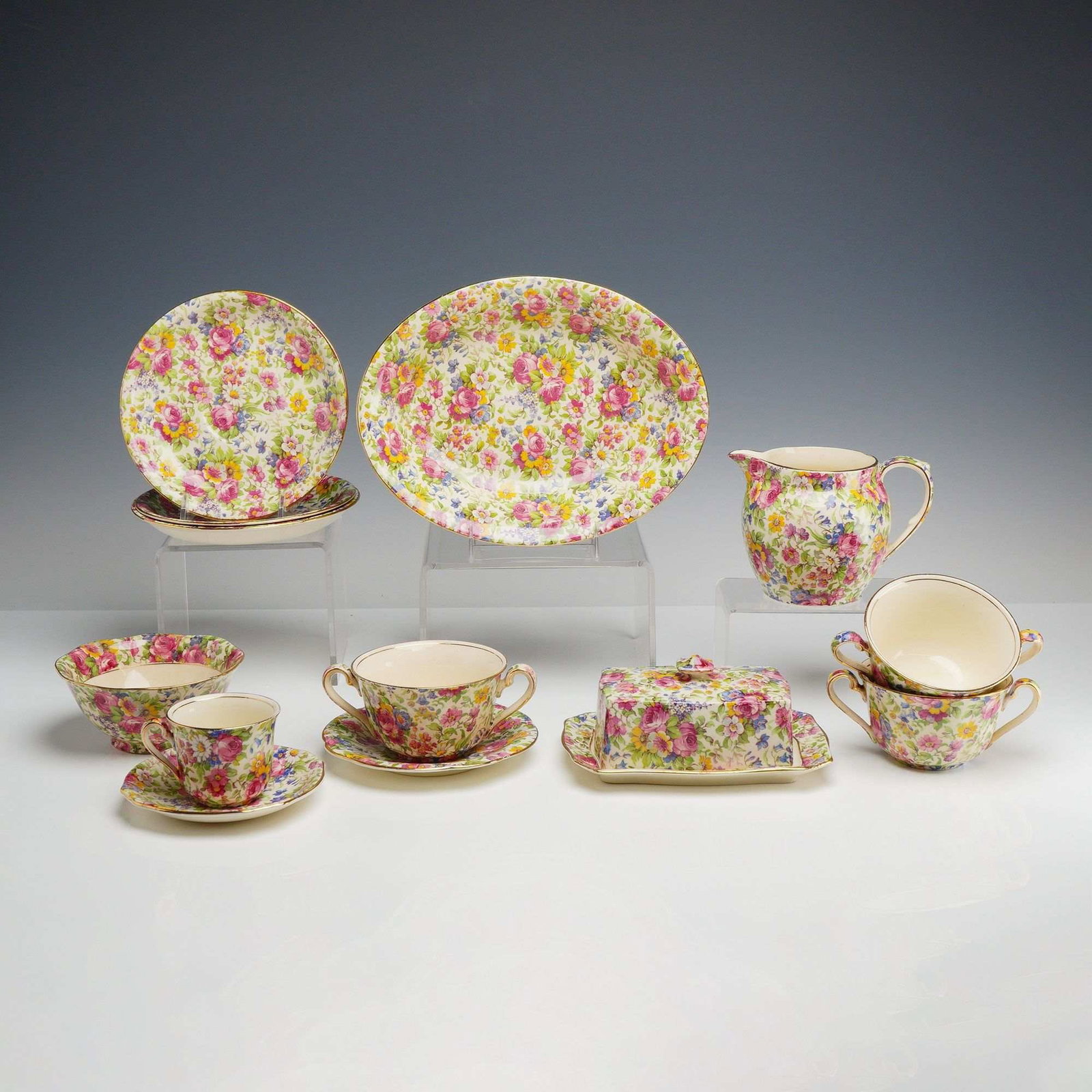13-Piece Collection of Royal Winton Grimwades Tableware Including Lidded Butter Dish, Summertime: The pieces were produced for the American market and specifically retailed by Wright Tyndale & van Roden Inc., a luxury importer based in Philadelphia. The set features an all-over transfer-printed