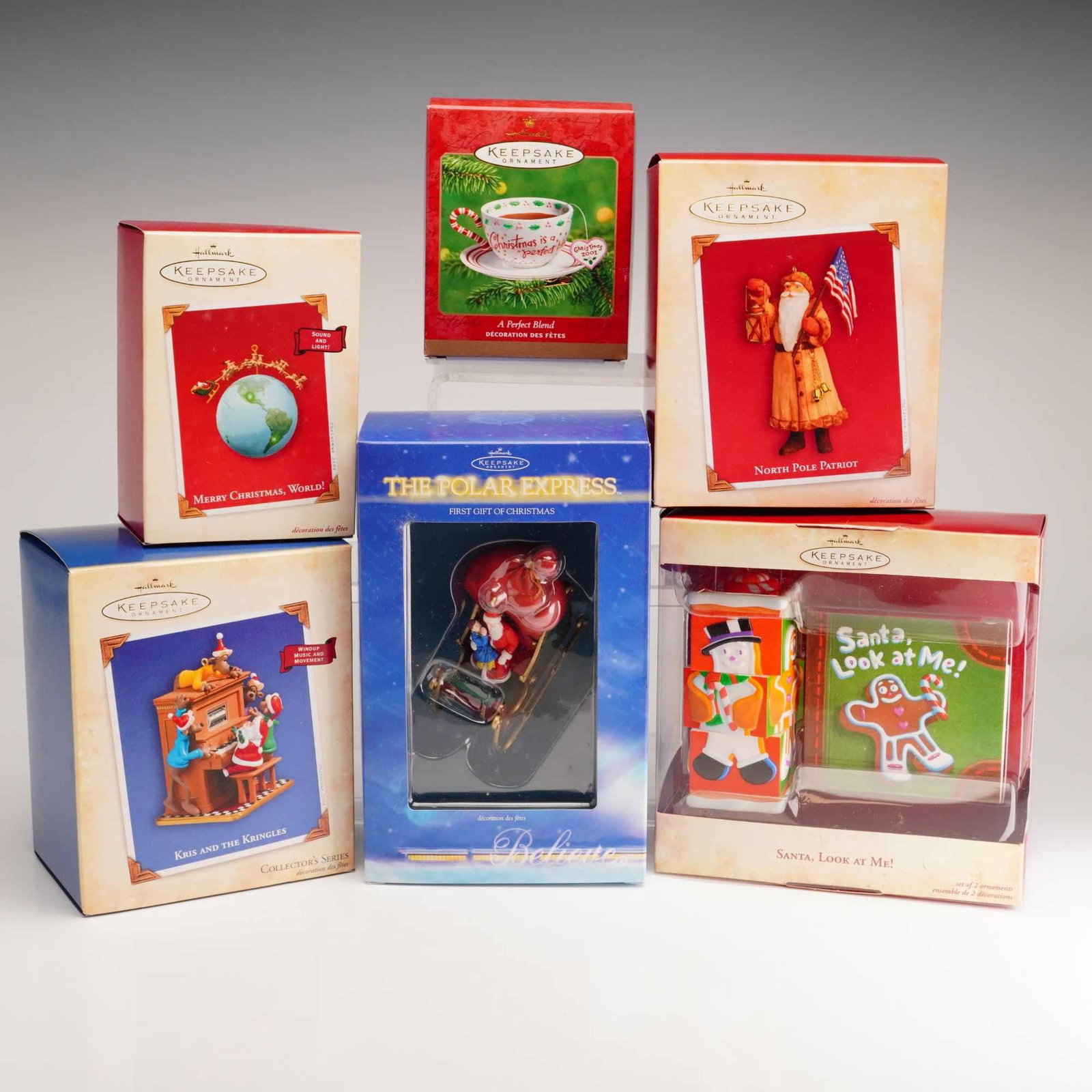 6pc Hallmark Keepsake Christmas Ornaments: This collection consists of six Hallmark Keepsake Christmas ornaments manufactured by Hallmark Cards, Inc. between 2001 and 2004. The items are constructed from handcrafted plastic and porcelain. Each