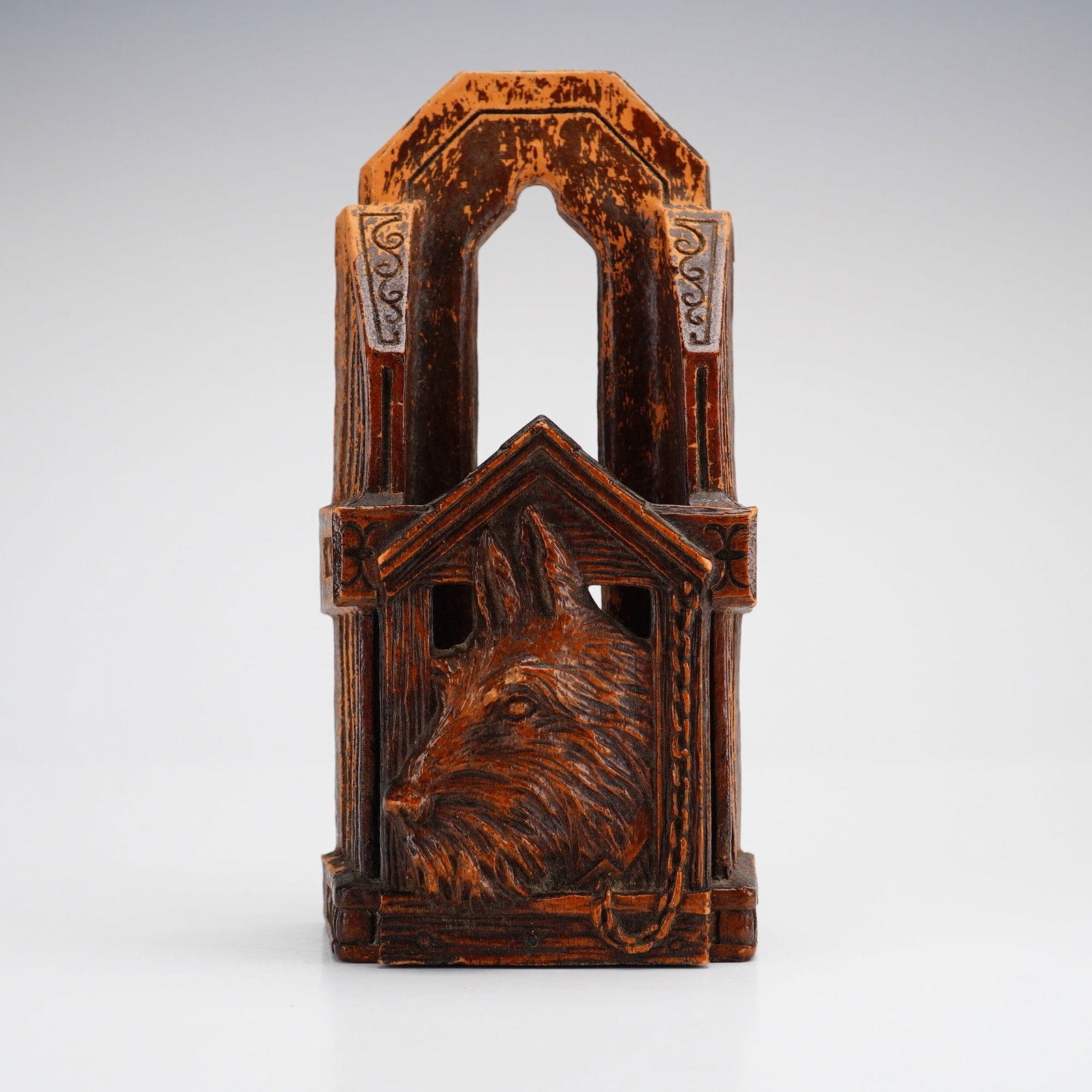 OrnaWood Scottish Terrier Match Holder: This vintage novelty match holder or spill vase is manufactured by OrnaWood, featuring a molded composition construction designed to simulate hand-carved wood. The front of the piece displays a high-r