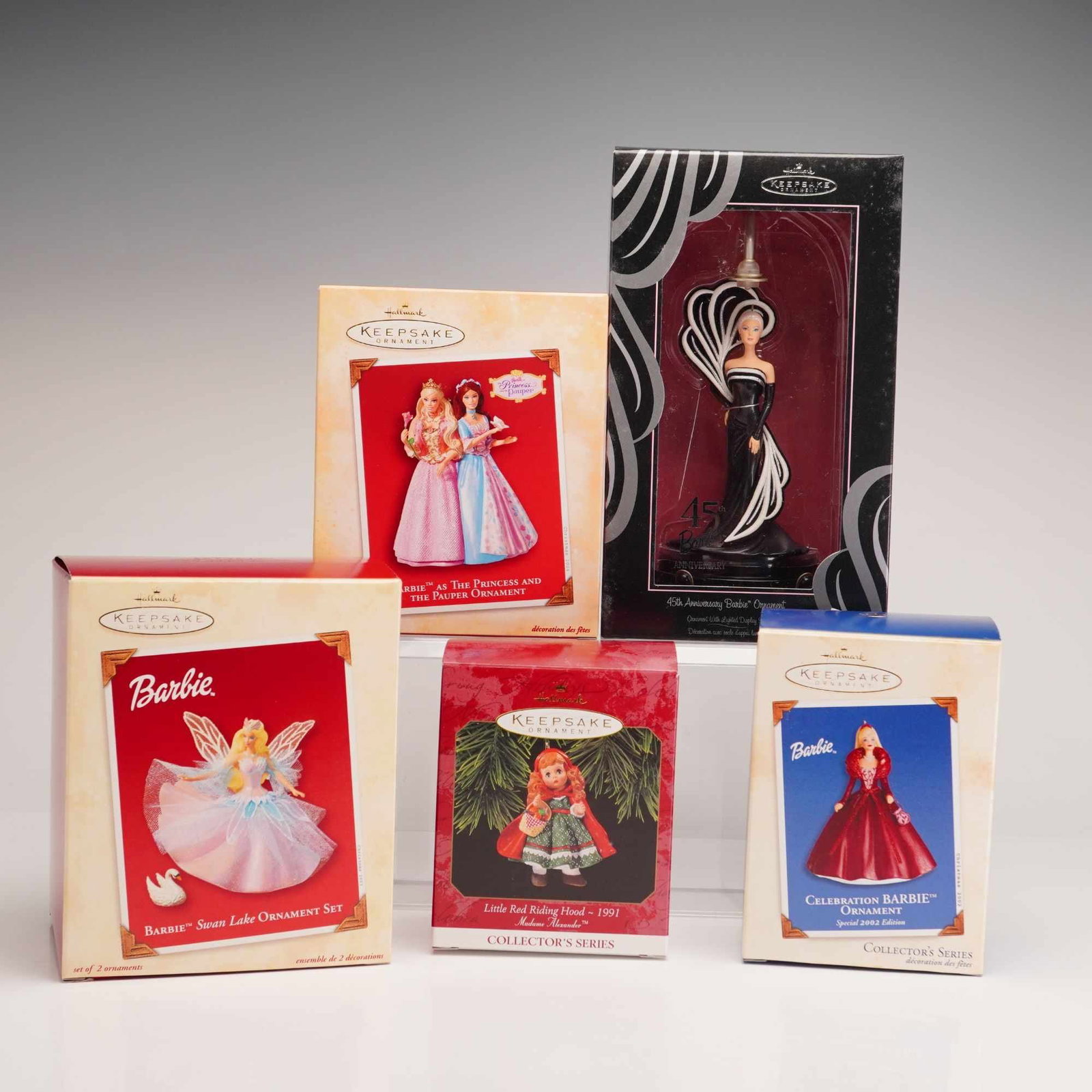 5pc Hallmark Keepsake Barbie and Madame Alexander Ornaments: This collection consists of five Hallmark Keepsake Ornaments, including four Barbie themed items and one from the Madame Alexander series. The figures are handcrafted from vinyl and plastic with fixed
