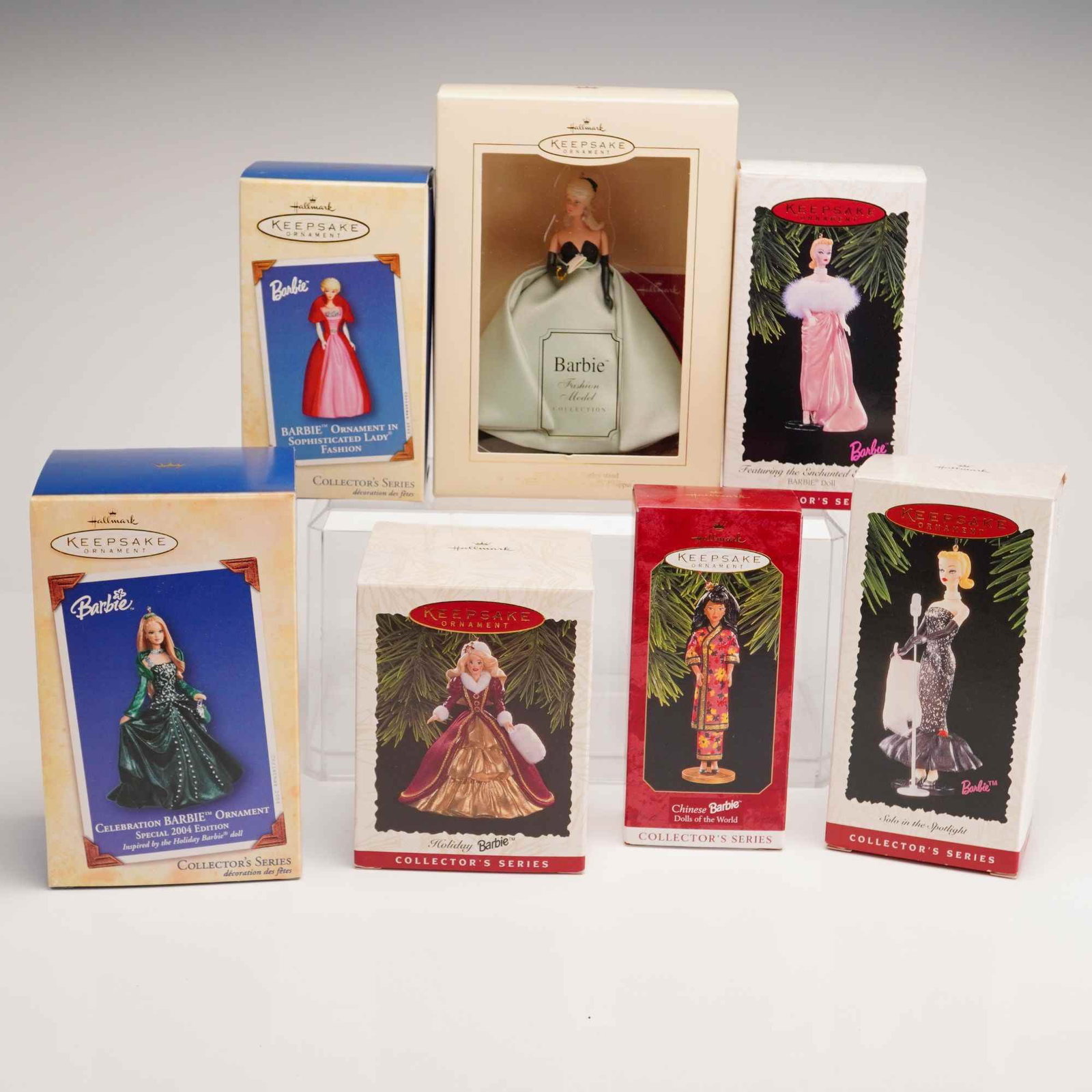 7pc Hallmark Keepsake Barbie Ornaments: A collection of seven Hallmark Keepsake ornaments manufactured between 1995 and 2004 under license from Mattel, Inc. These handcrafted ornaments are constructed from plastic and vinyl, with the Lisett