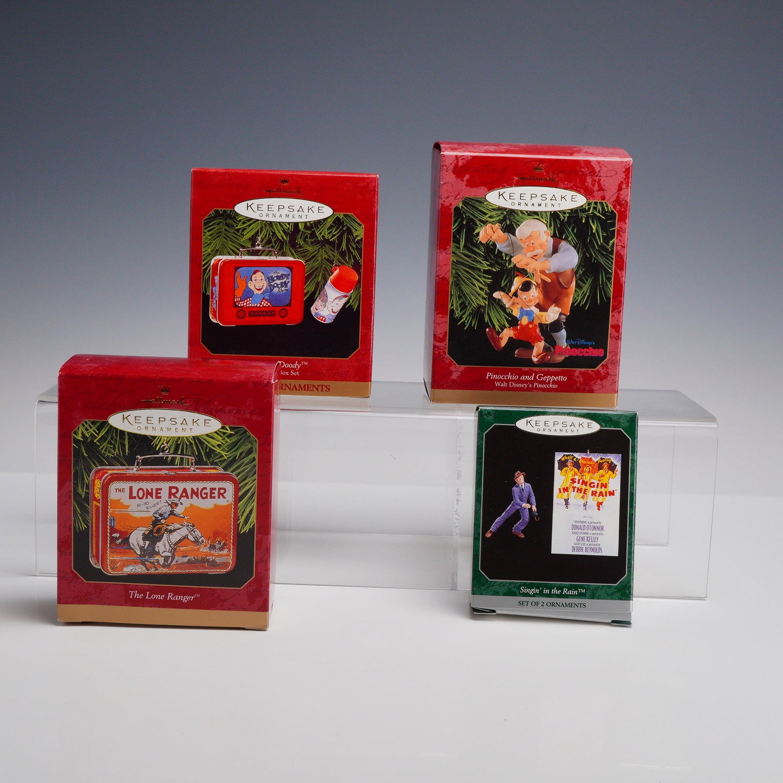 4pc Hallmark Keepsake Ornaments Featuring Licensed Characters: This collection features four Hallmark Keepsake Ornaments manufactured by Hallmark Cards, Inc. between 1997 and 1999. The set includes the 1999 Howdy Doody Lunch Box Set, consisting of a miniature