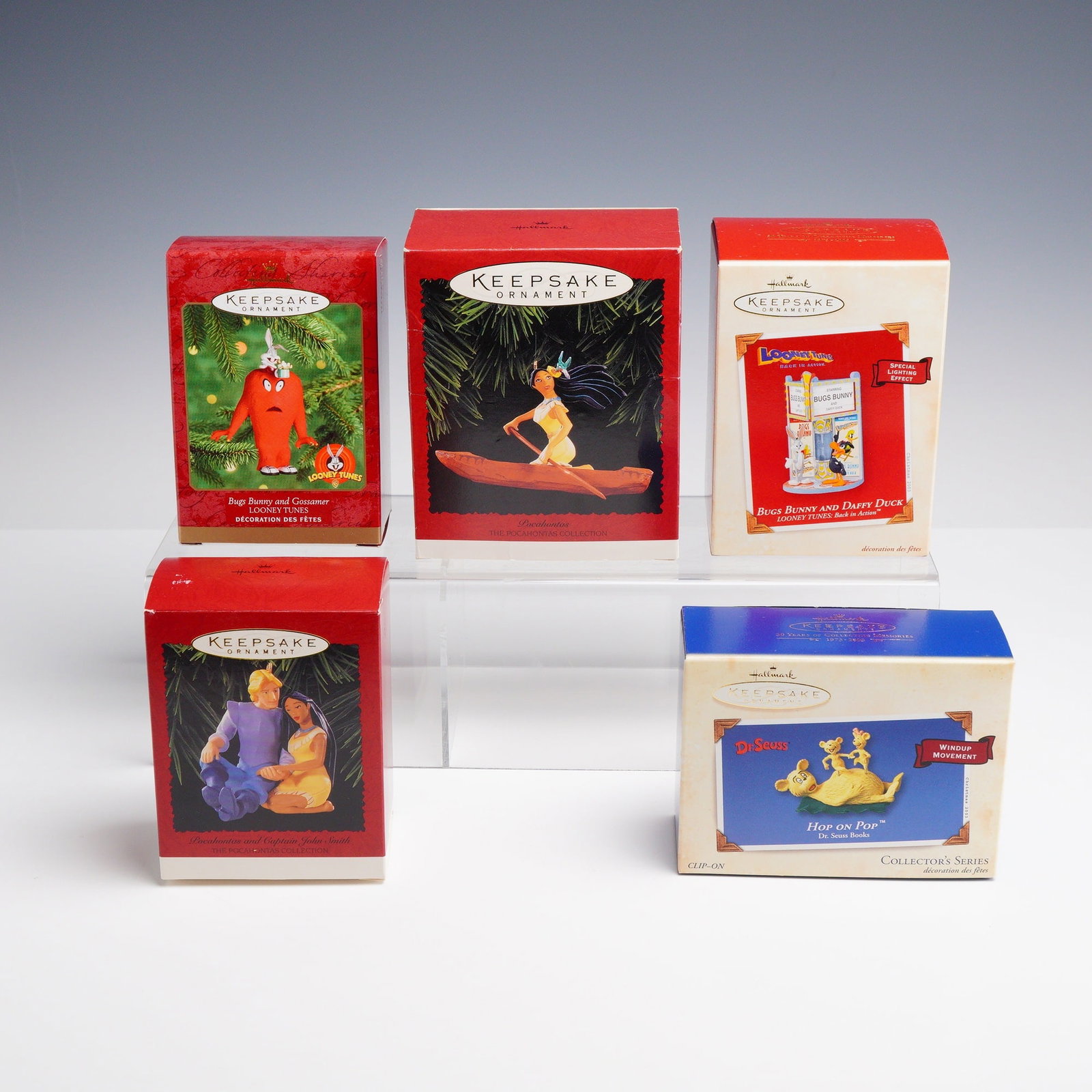 5pc Hallmark Keepsake Ornaments: A collection of 5 Hallmark Keepsake ornaments featuring characters from Disney, Looney Tunes, and Dr. Seuss. The group includes five ornaments identified by their original packaging: a 1999 Bugs