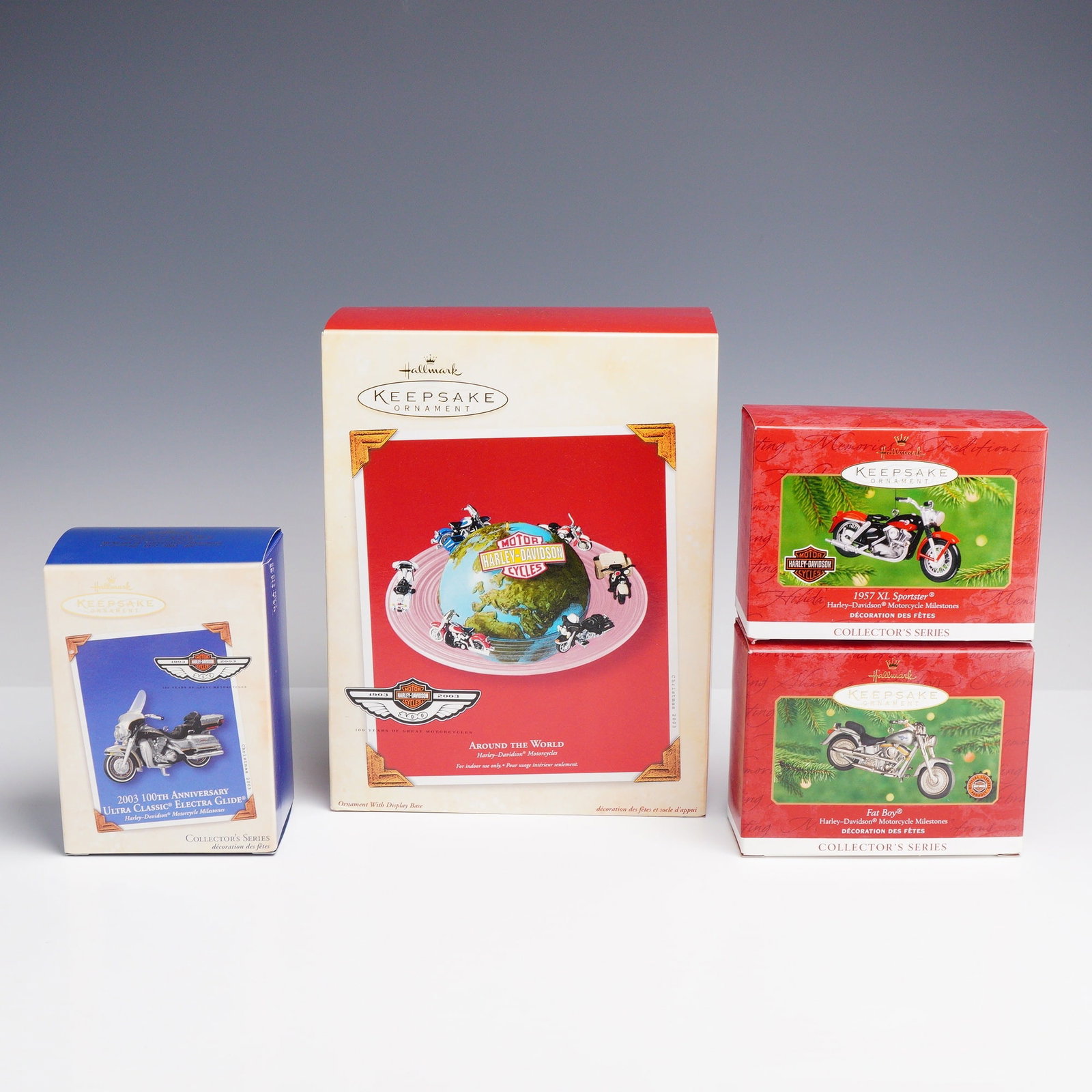 4pc Hallmark Keepsake Harley-Davidson Motorcycle Ornaments: This collection includes four Hallmark Keepsake ornaments featuring officially licensed Harley-Davidson motorcycles, all presented in their original packaging. The group features three ornaments from