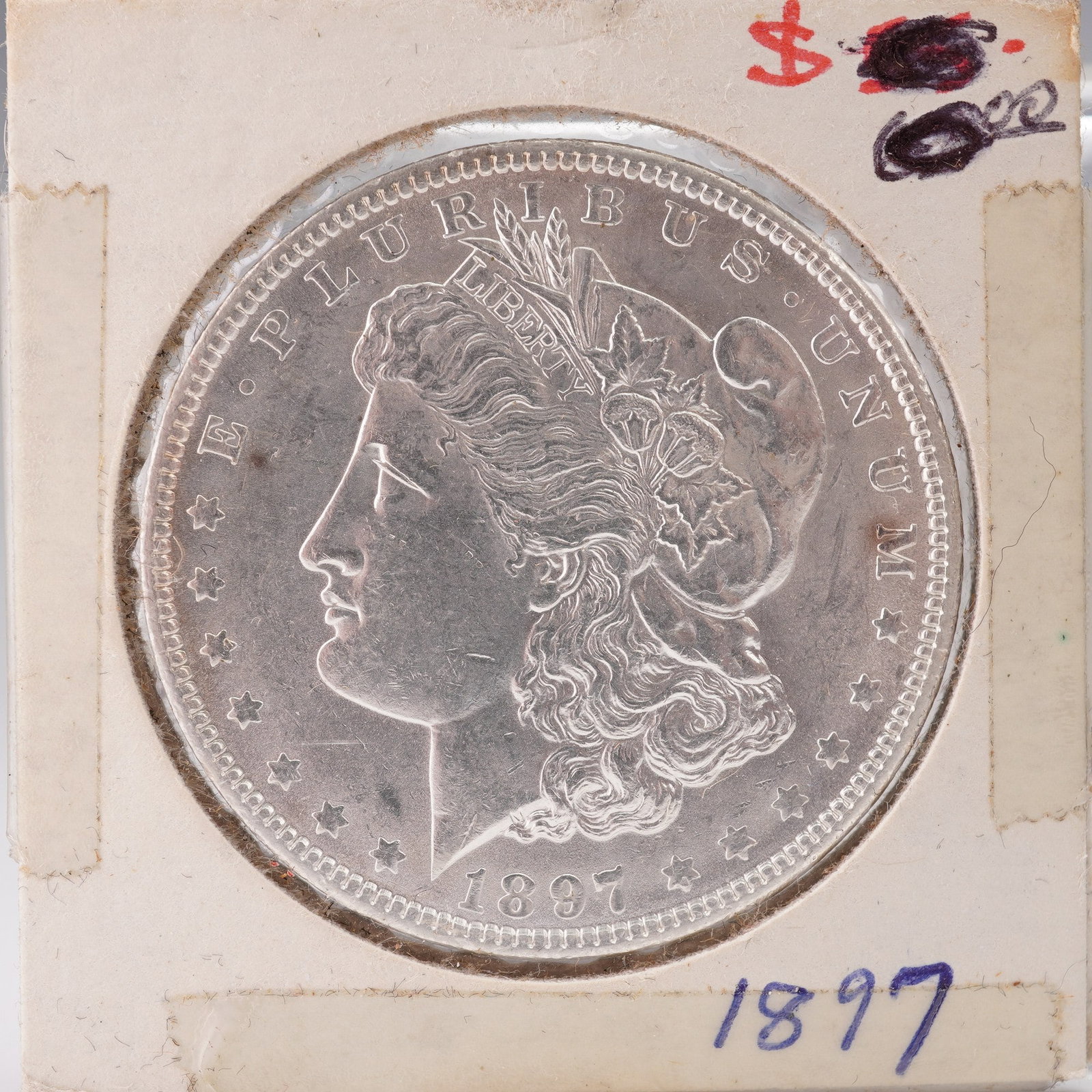 1897 United States Morgan Silver Dollar: The Morgan dollar is a United States silver dollar minted from 1878 to 1904 and again in 1921. It was the first standard silver dollar produced following the Coinage Act of 1873 and contains 412.5 Tro