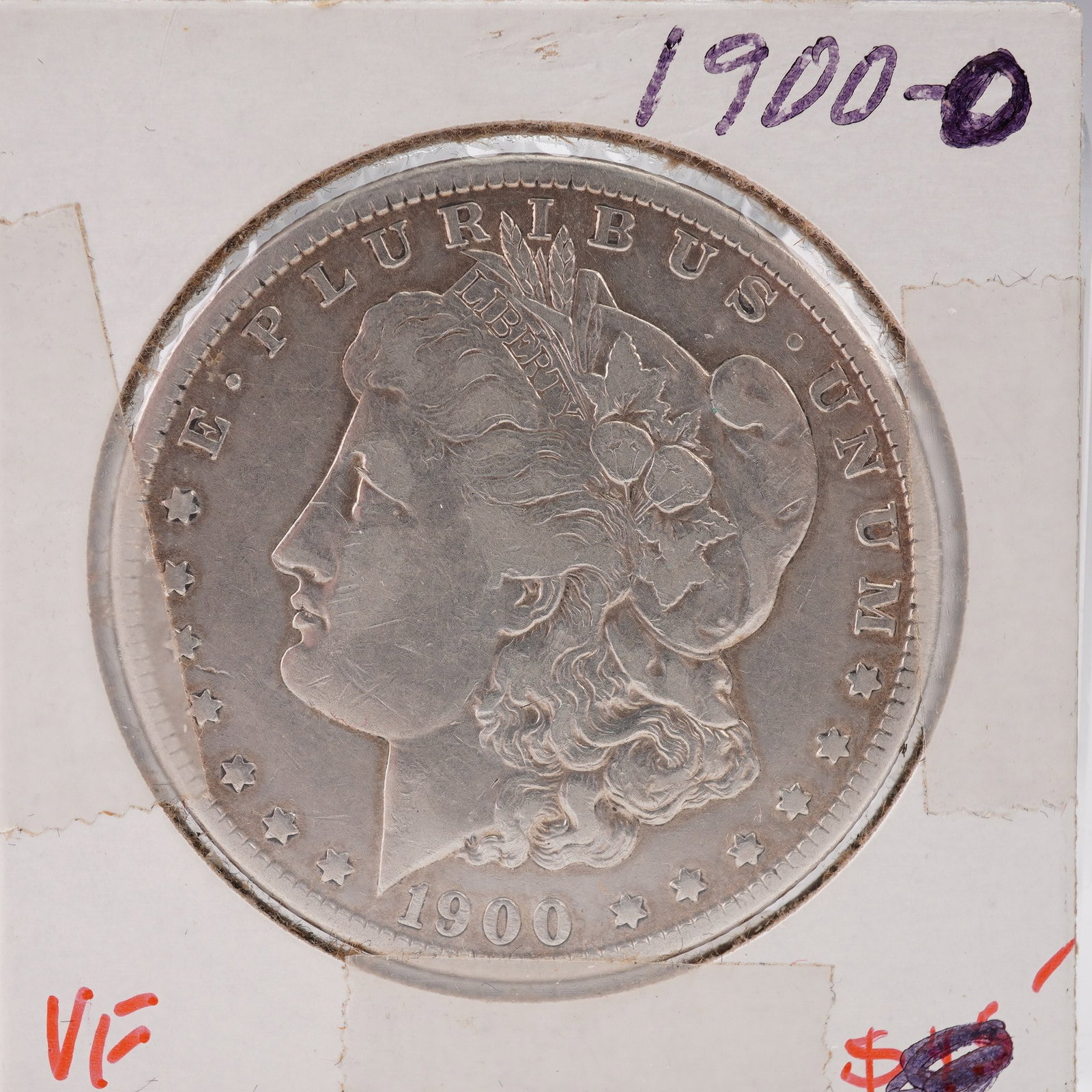 1900-O United States Morgan Silver Dollar: The Morgan dollar is a United States silver dollar minted from 1878 to 1904 and again in 1921. It was the first standard silver dollar produced following the Coinage Act of 1873 and contains 412.5 Tro