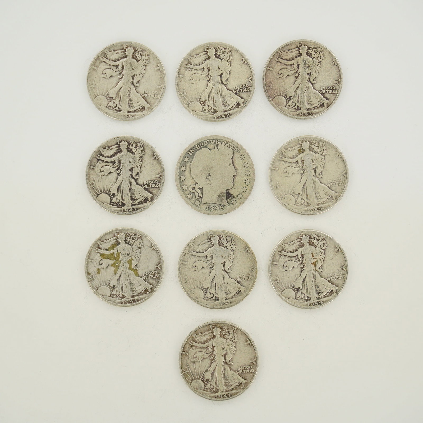 A Collection of US Walking Liberty and Barber Silver Half Dollars in a Mixed Date Bag (1 of 2)