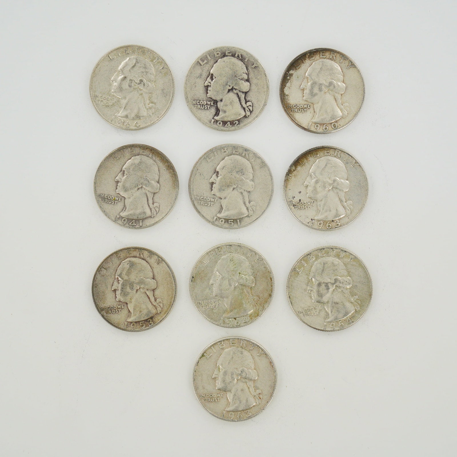 10pc Collection of US Washington Quarters, 1941-1964: A collection of US Washington quarters struck in 90 percent silver. This mixed date bag of coins includes examples dating from 1941 to 1964. The group contains specimens from the Denver Mint, with the