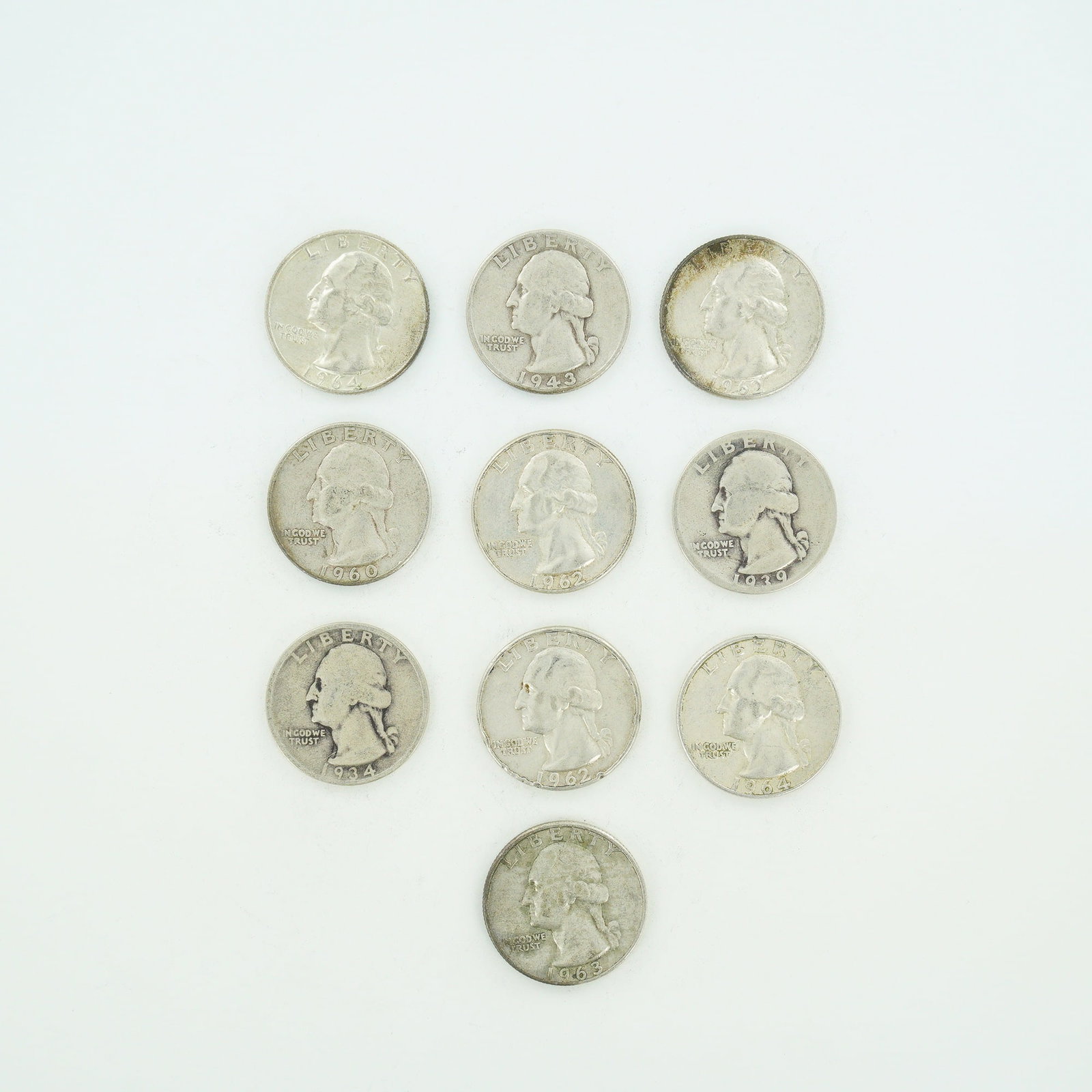 10pc Pre-1964 U.S. 90% Silver Washington Quarters: A collection of ten US Washington Quarter Dollars struck in 90% silver. This mixed date bag of coins includes issues from the Philadelphia, Denver, and San Francisco mints. The specific dates and mint