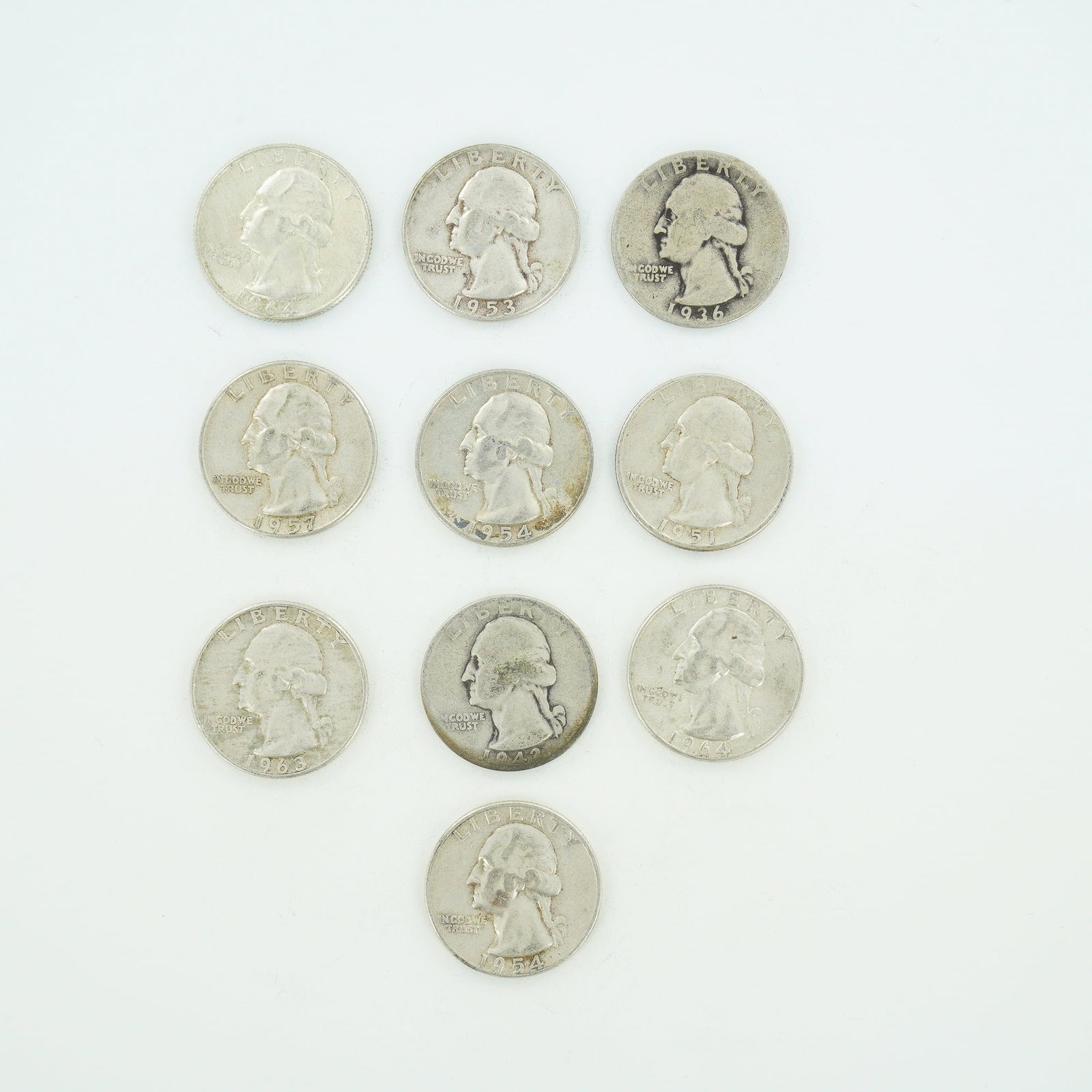 10pc Pre-1964 U.S. 90% Silver Washington Quarters: A collection of US Washington quarter dollars struck in 90% silver. This mixed date bag of coins includes specimens with the following dates and mint marks: 1936, 1942-D, 1951-D, 1953-D, 1954-D, 1957-
