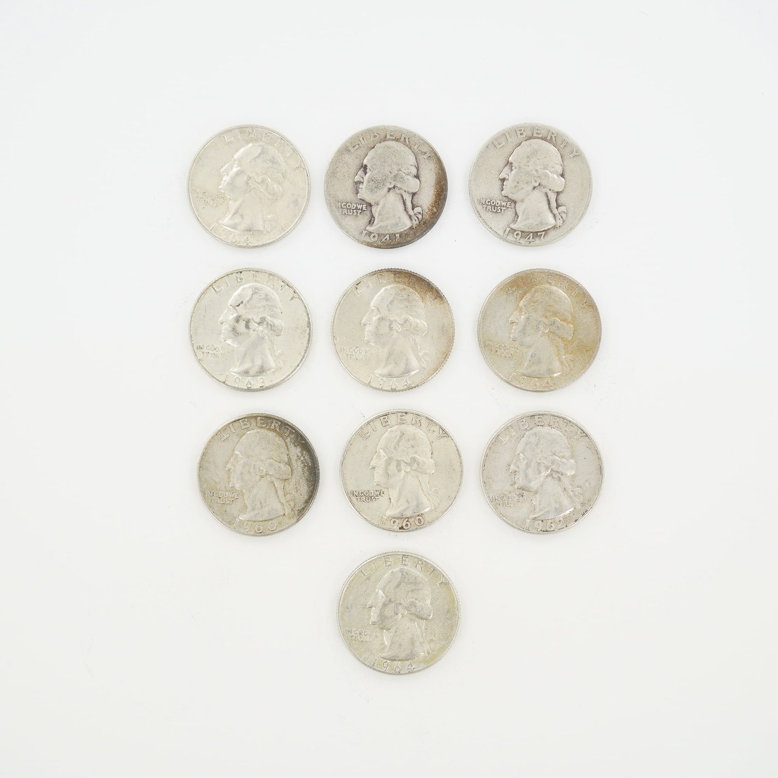 10pc Pre-1964 U.S. 90% Silver Washington Quarters: A collection of ten US Washington Quarter Dollars struck in a 90% silver and 10% copper composition. The group includes coins with dates 1941, 1947, 1960 (two examples), 1962, 1963, and 1964 (four exa