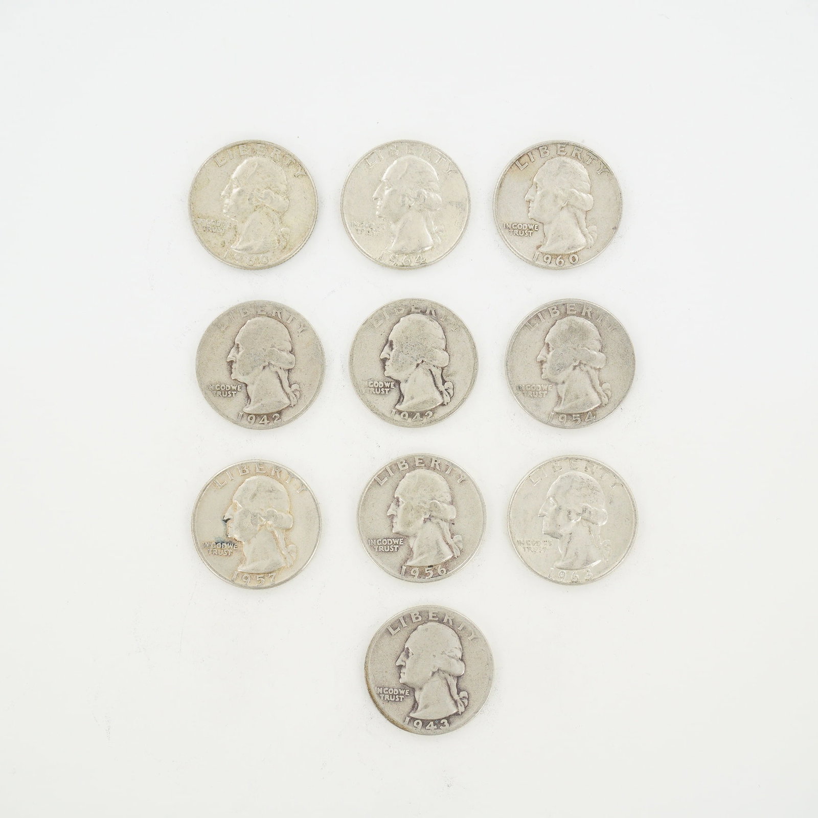 10pc Pre-1964 U.S. 90% Silver Washington Quarters: A collection of US Washington Quarter Dollars (KM# 164) struck in 90% silver. The assortment includes various dates and mint marks from 1940 through 1964, featuring examples from the Philadelphia,