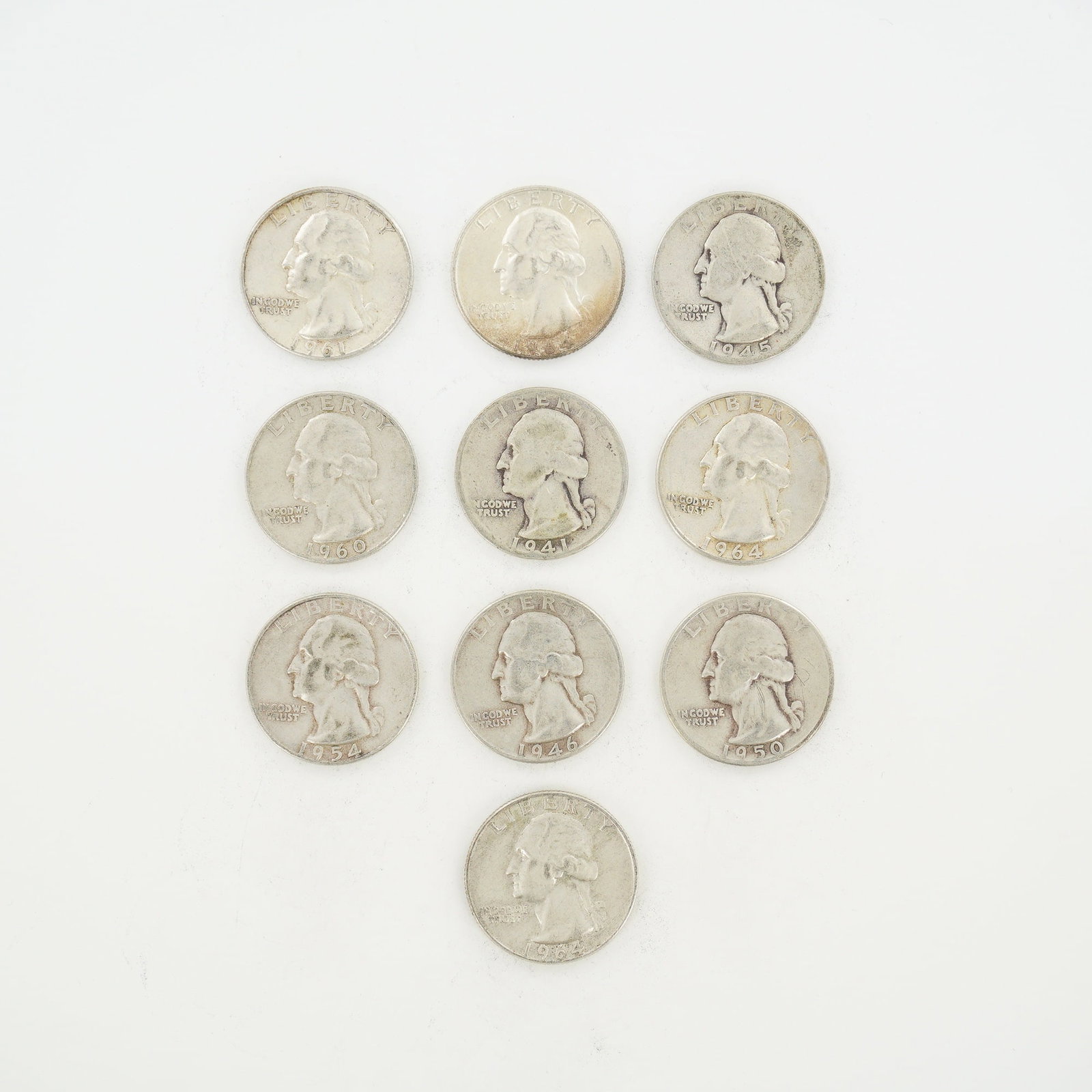 10pc Pre-1964 U.S. 90% Silver Washington Quarters: A collection of US Washington Quarter Dollar coins struck in 90% silver. The coins feature the Washington portrait obverse and the eagle reverse. Visible inscriptions include Liberty, In God We Trust,